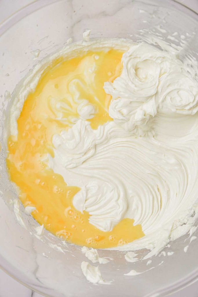 beaten egg in large bowl