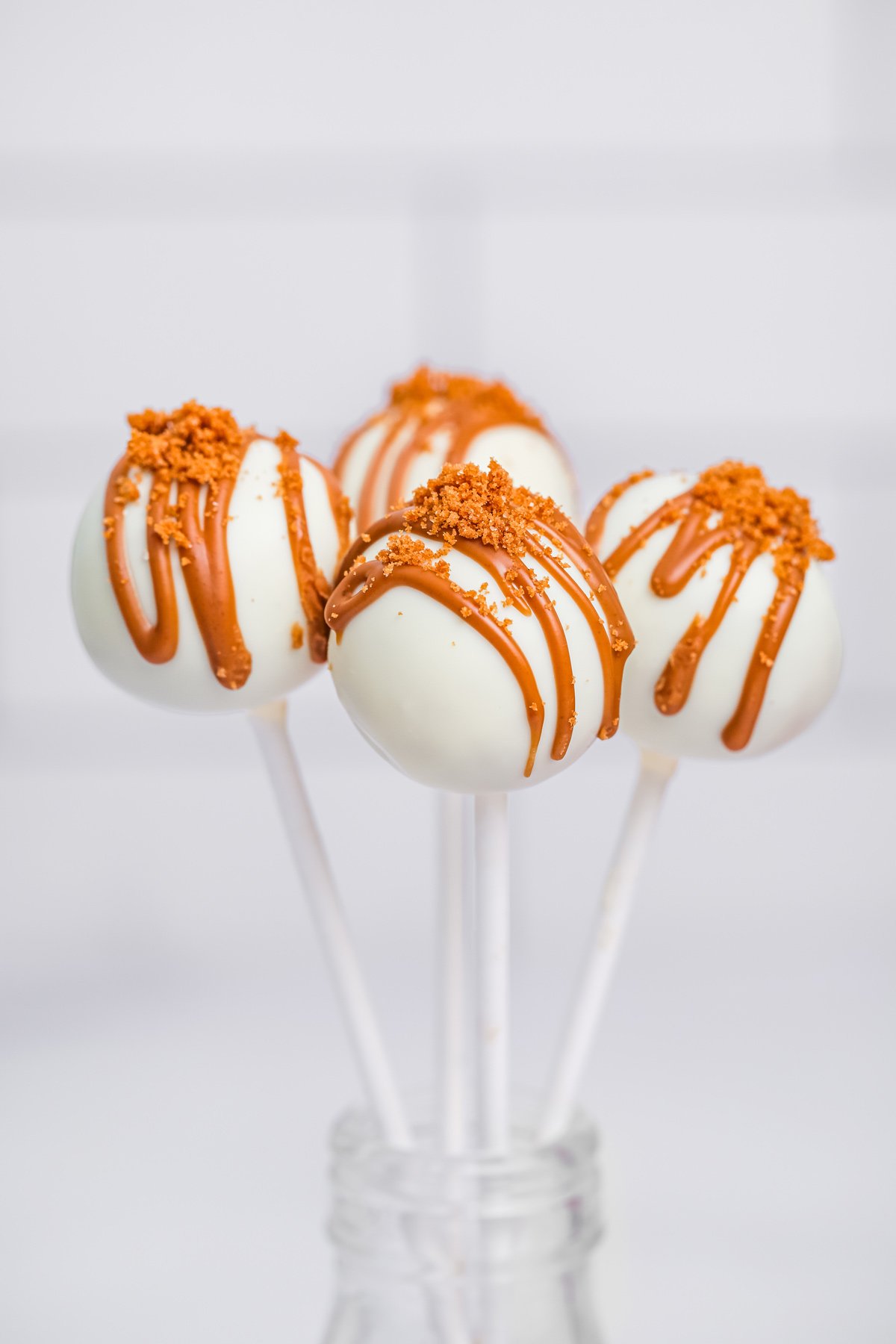 finished biscoff cake pops coated in white chocolate