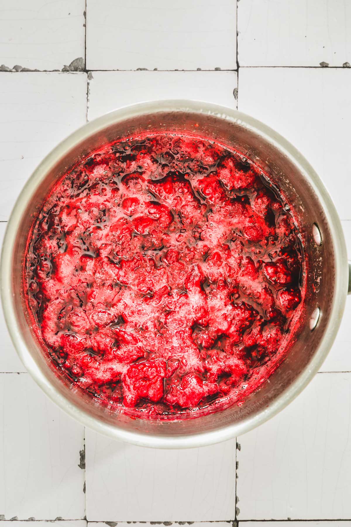 saucepan with raspberry mixture