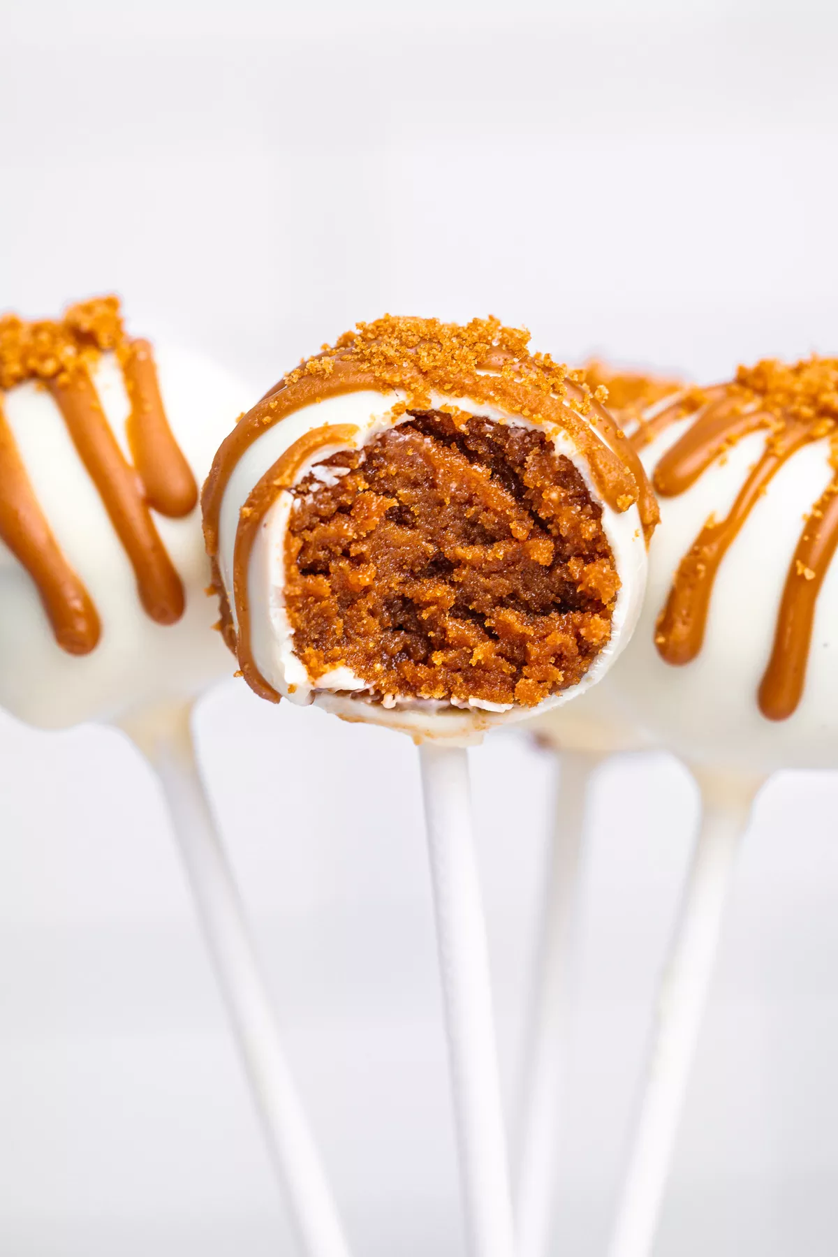 biscoff cake pop bitten showing the creamy center