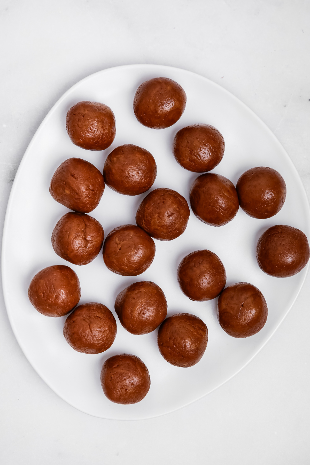 rolled biscoff cake pop ball on a plate