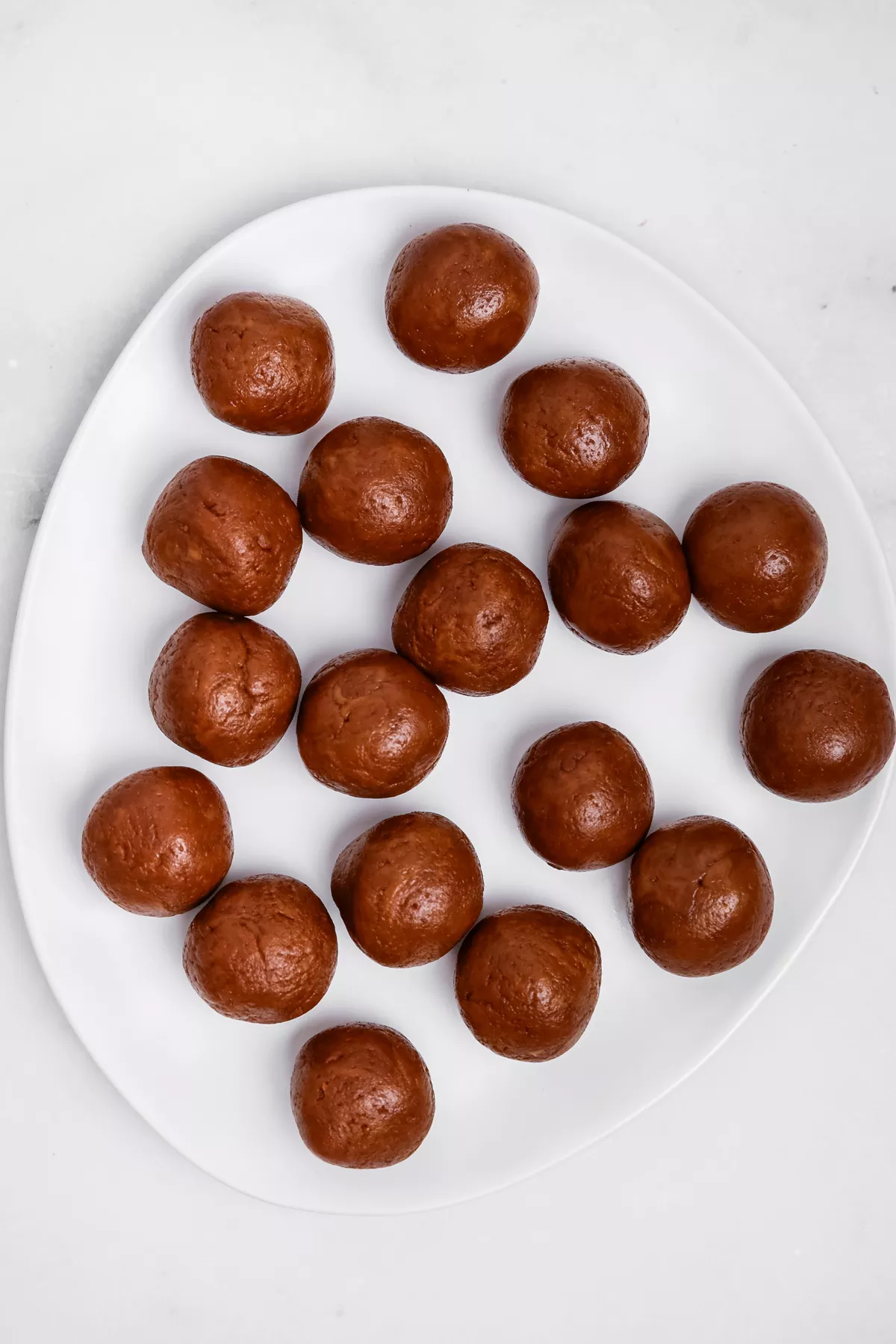 rolled biscoff cake pop ball on a plate