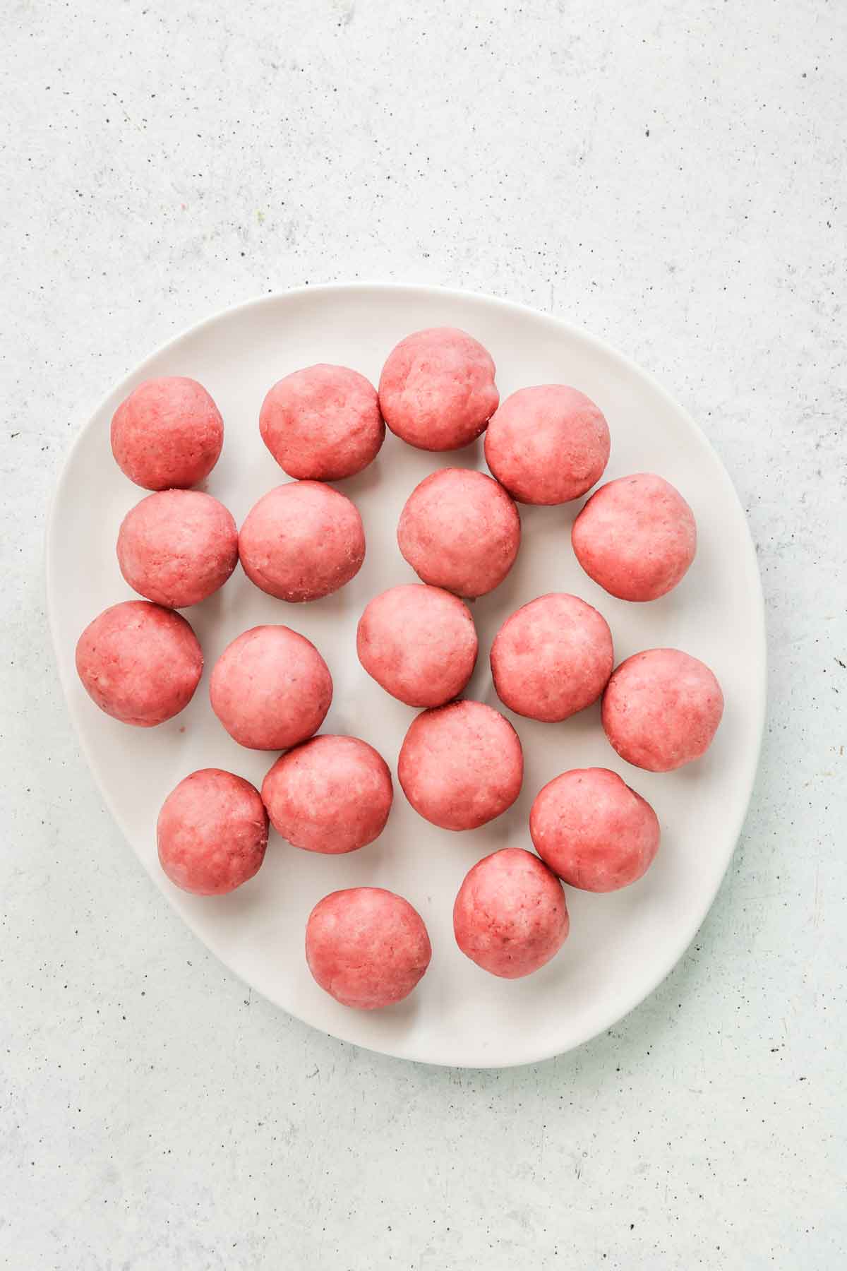 plate with strawberry cake balls