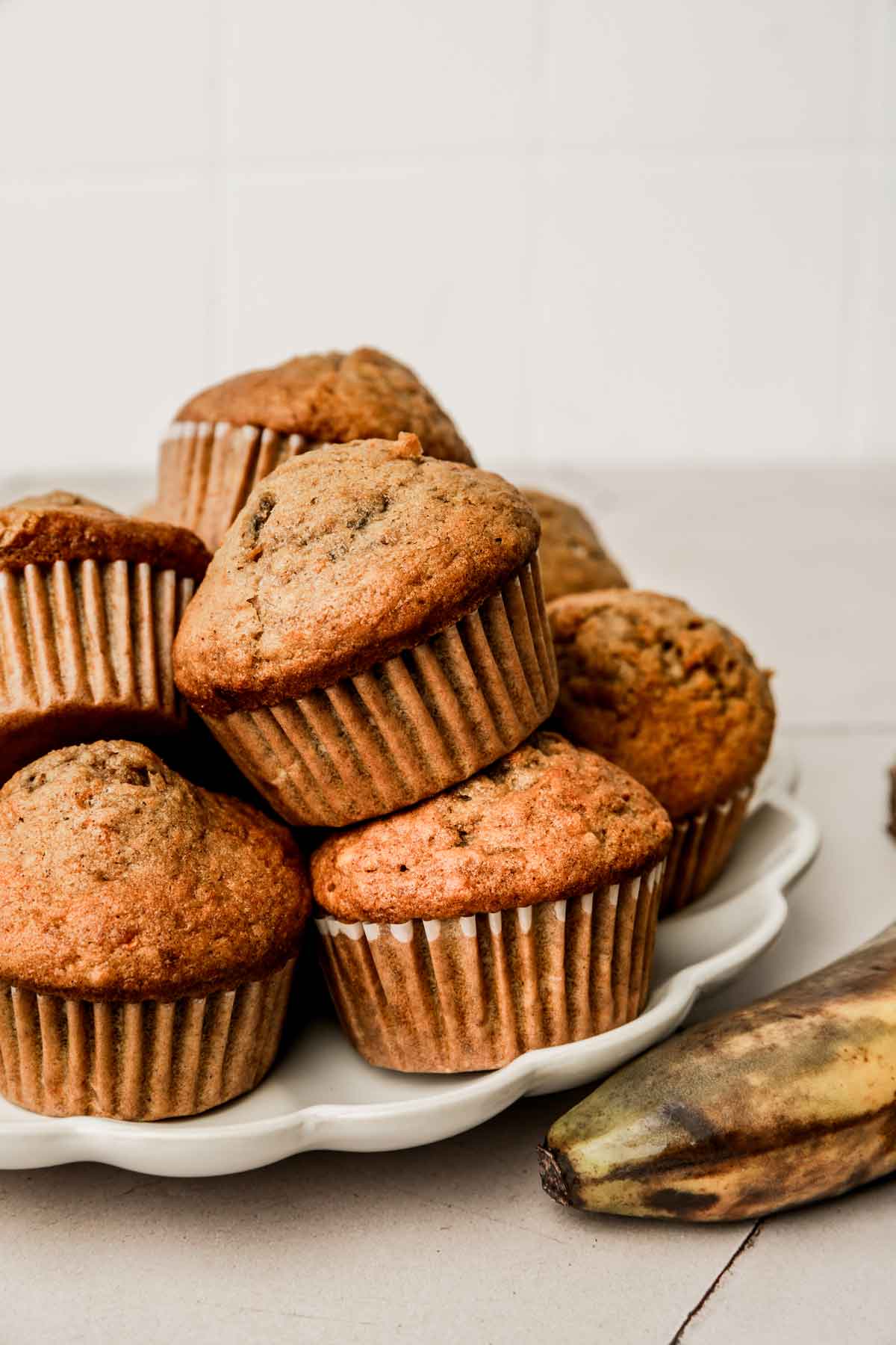 Homemade pumpkin banana muffins served on a plate
