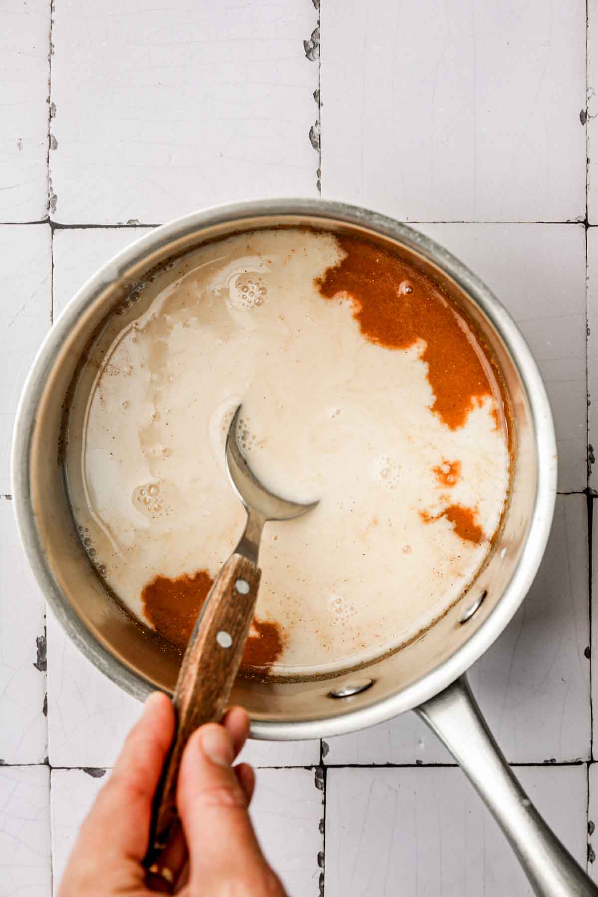 saucepan with pumpkin mixture and milk