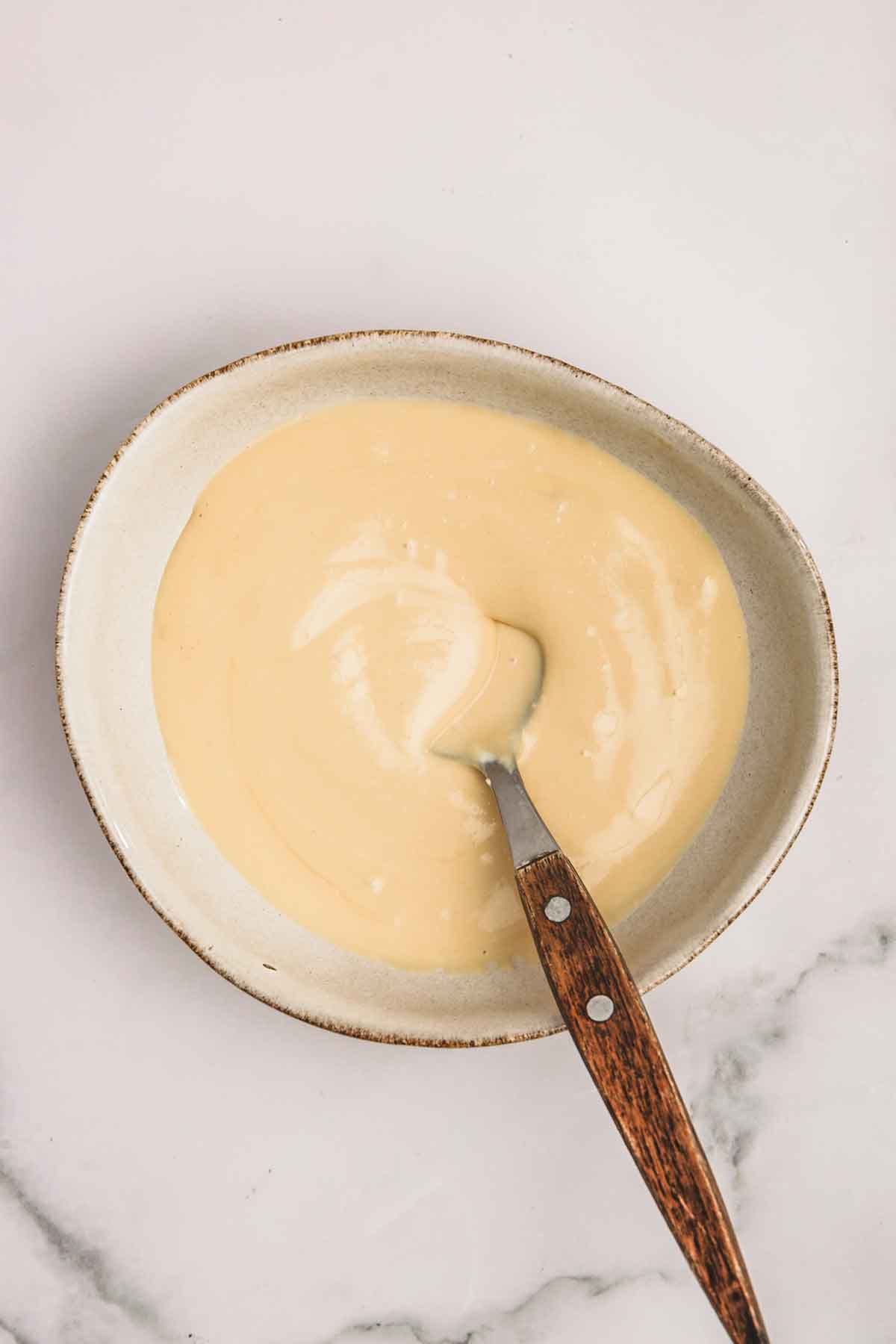 bowl with caramel cream cheese icing
