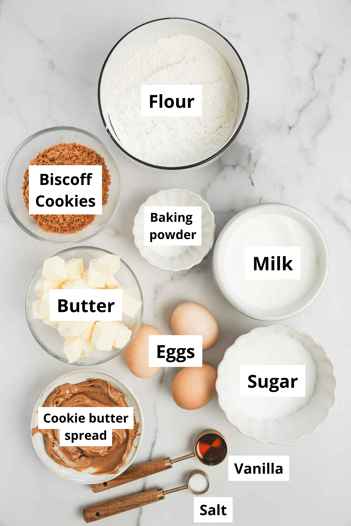 ingredients for cookie butter cake in bowls
