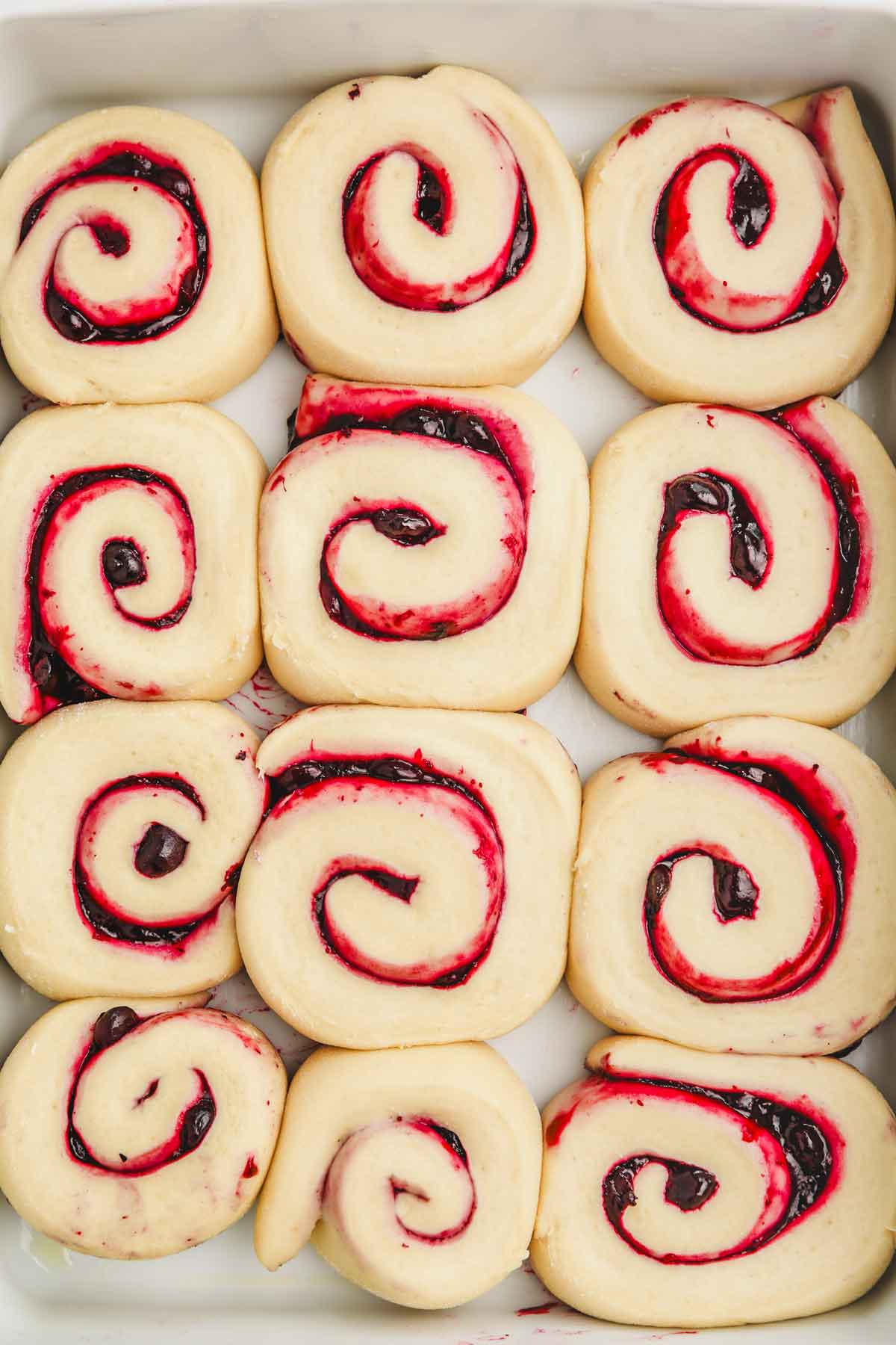 baking dish with blueberry rolls