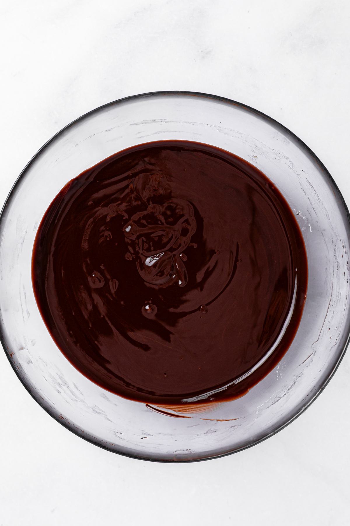 melted chocolate and butter mixture in a bowl