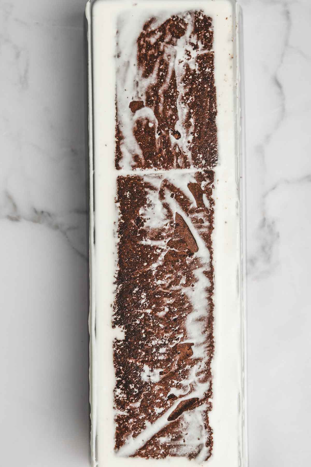 log mold with a chocolate log cake