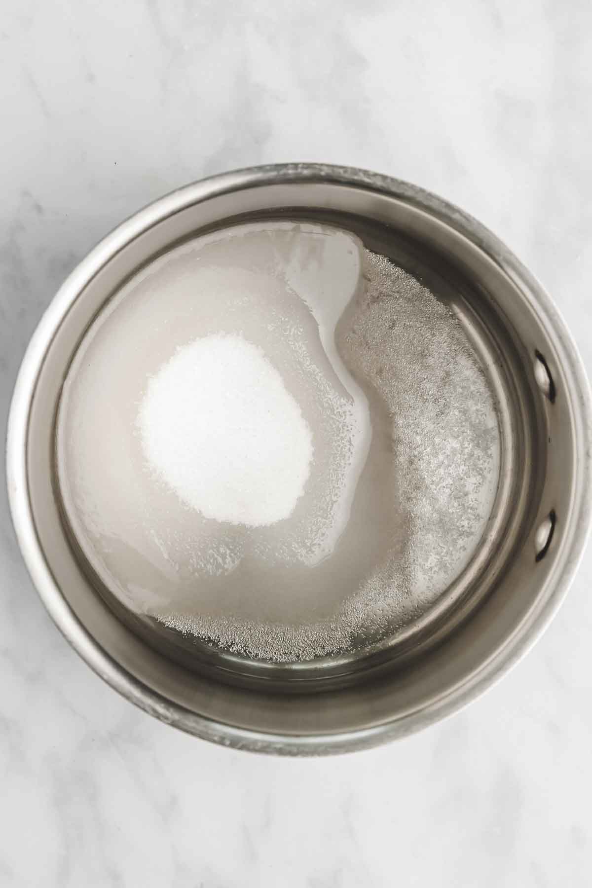 saucepan with sugar and water