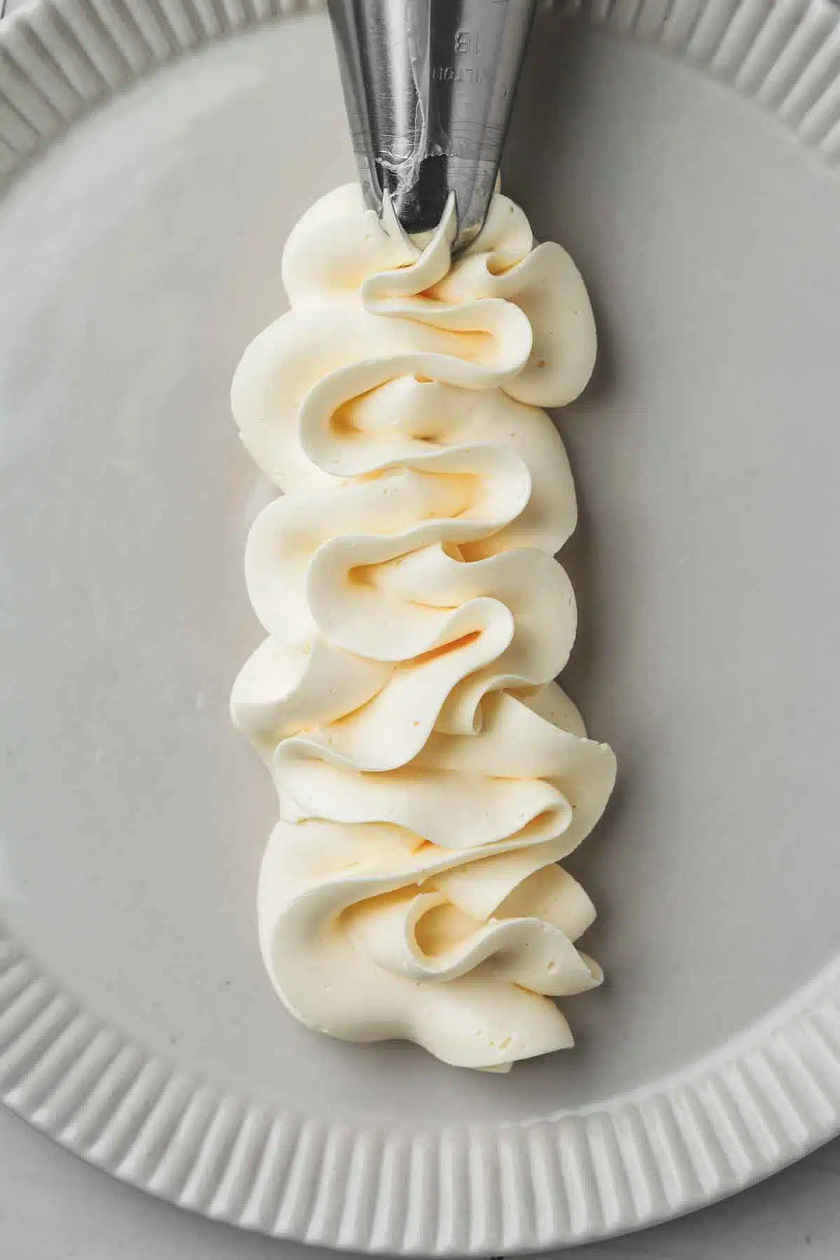 plate with pipped french meringue buttercream