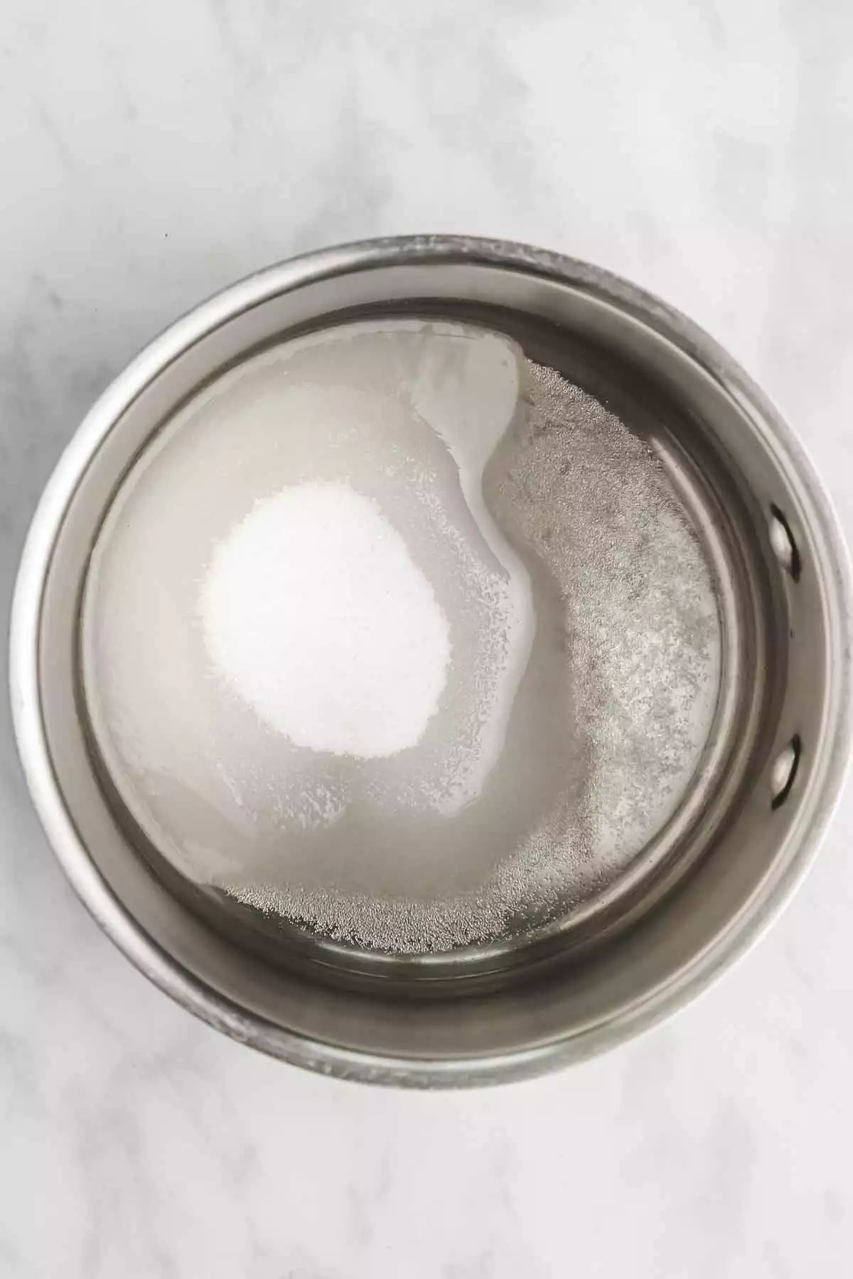saucepan with sugar and water