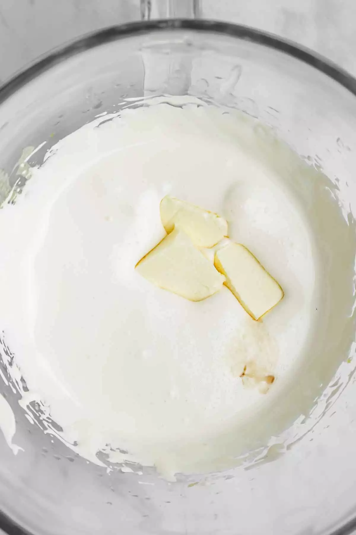 mixing bowl with french meringue and butter