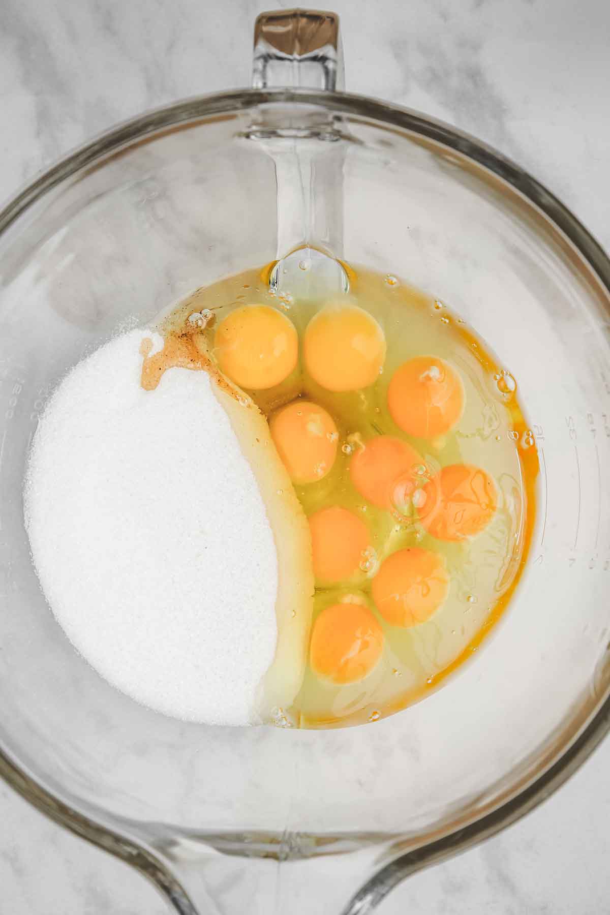 miwing bowl with eggs and sugar