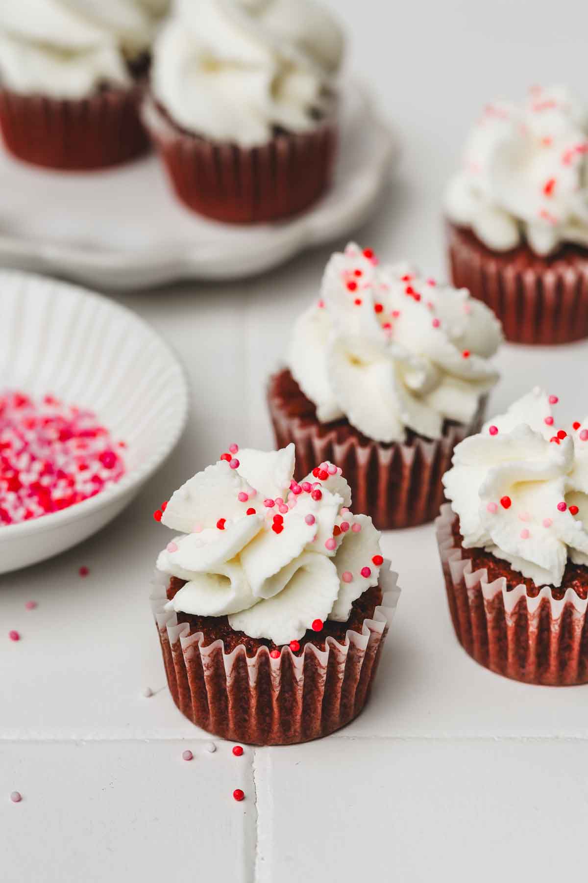 mini red velvet cupcakes in a table