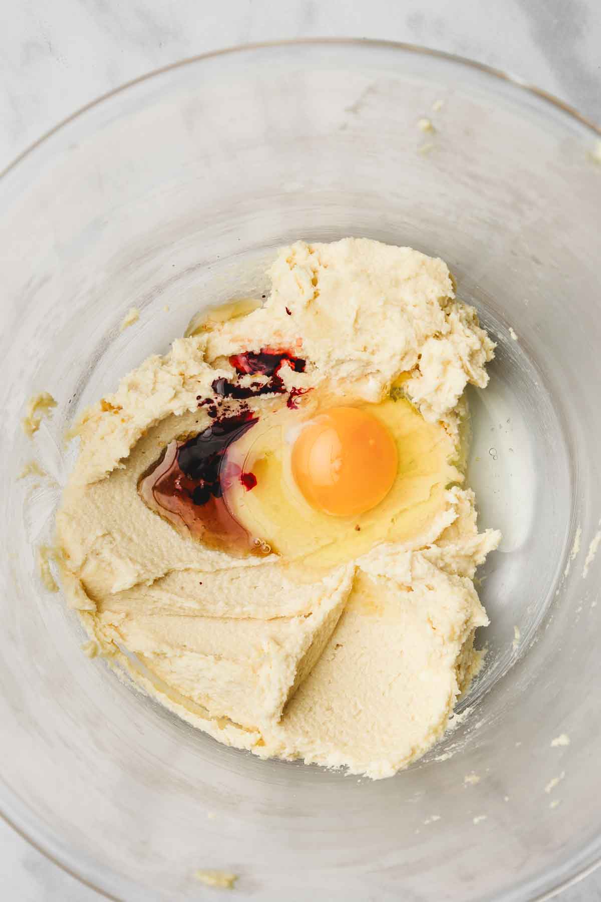 mixing bowl with egg and creamed butter