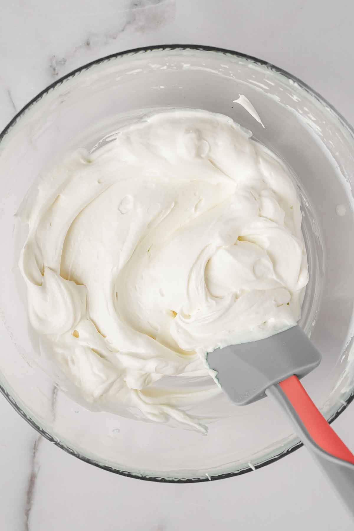 large bowl with whippped cream cheese mixture