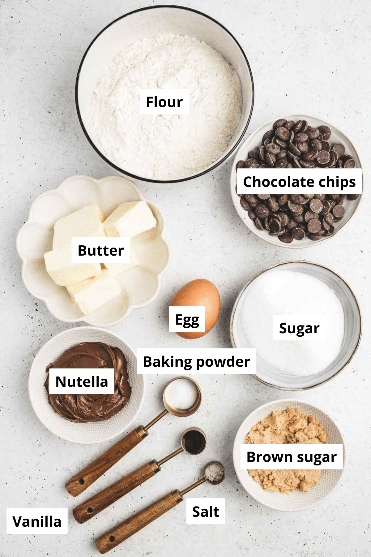 bowls with chocolate chips cookies ingredients