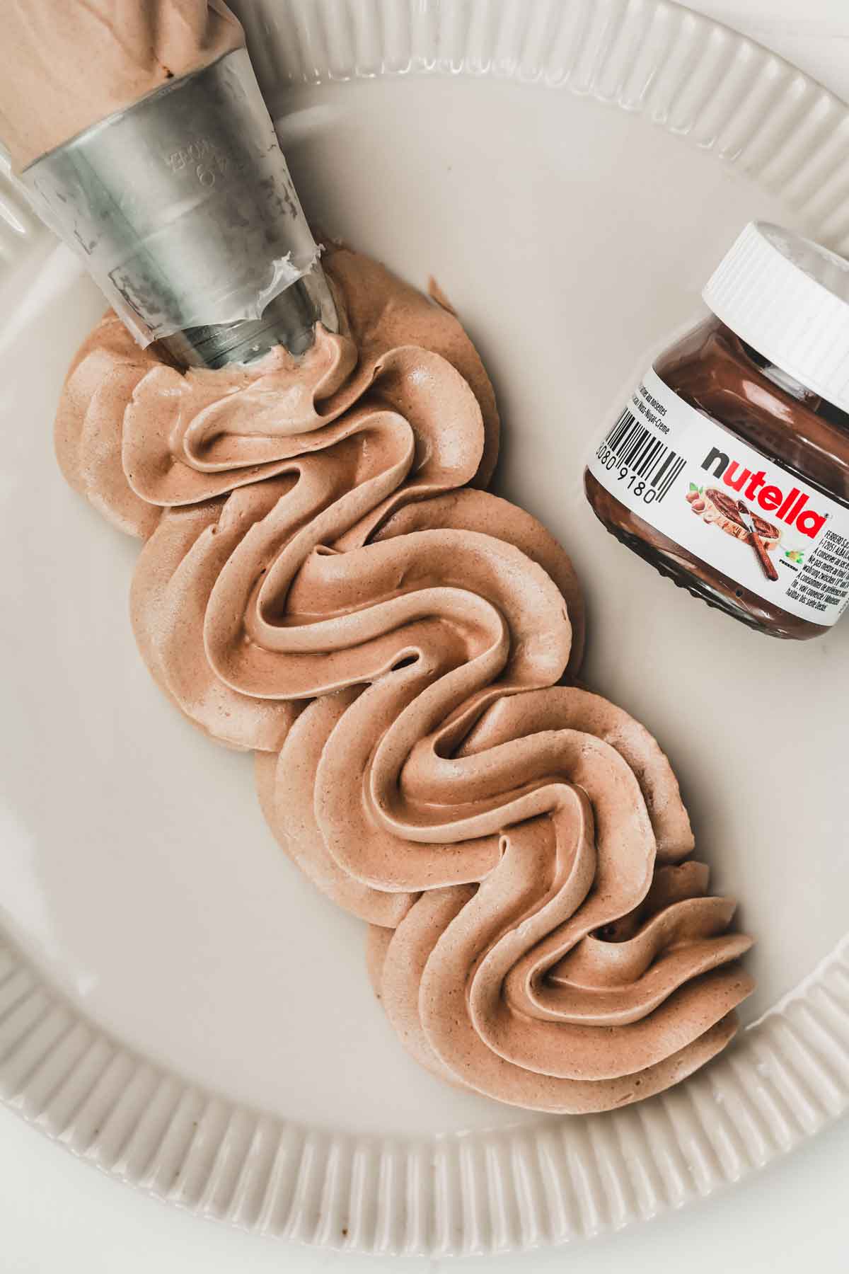 pipped nutella buttercream on a table