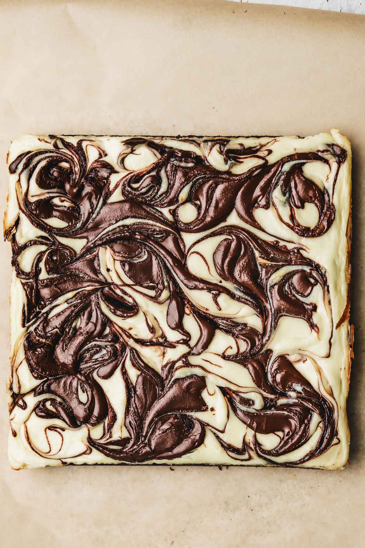 baked cheesecake brownies with nutella swirl