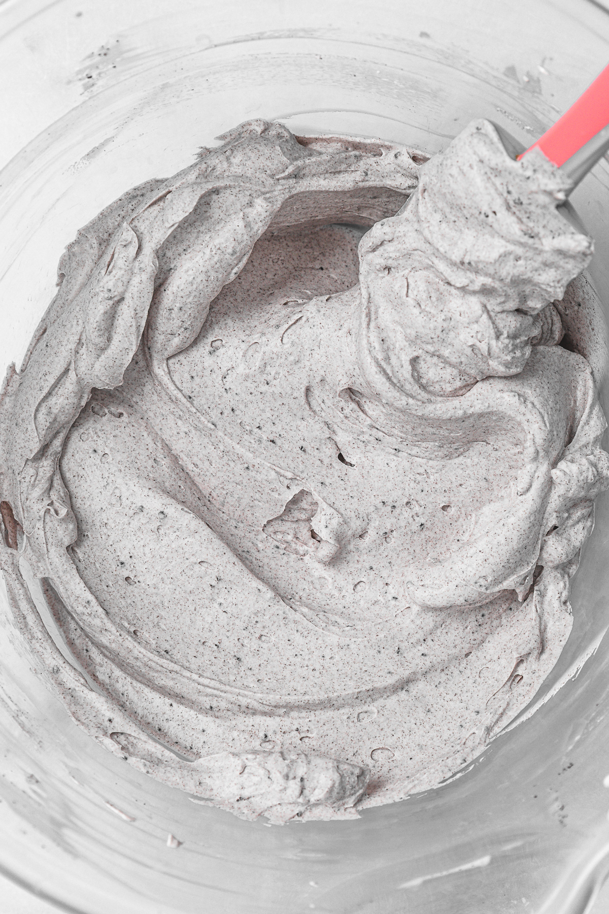 bowl of whipped oreo cream cheese frosting