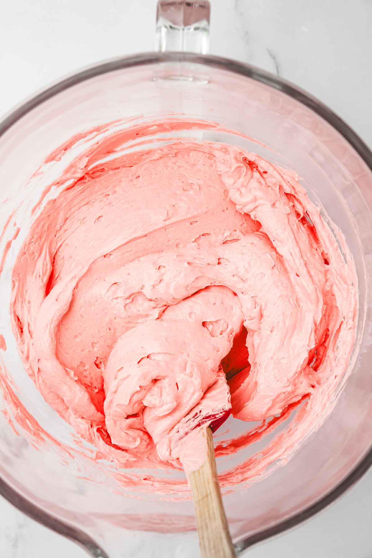 mixing bowl with whipped strawberry buttercream