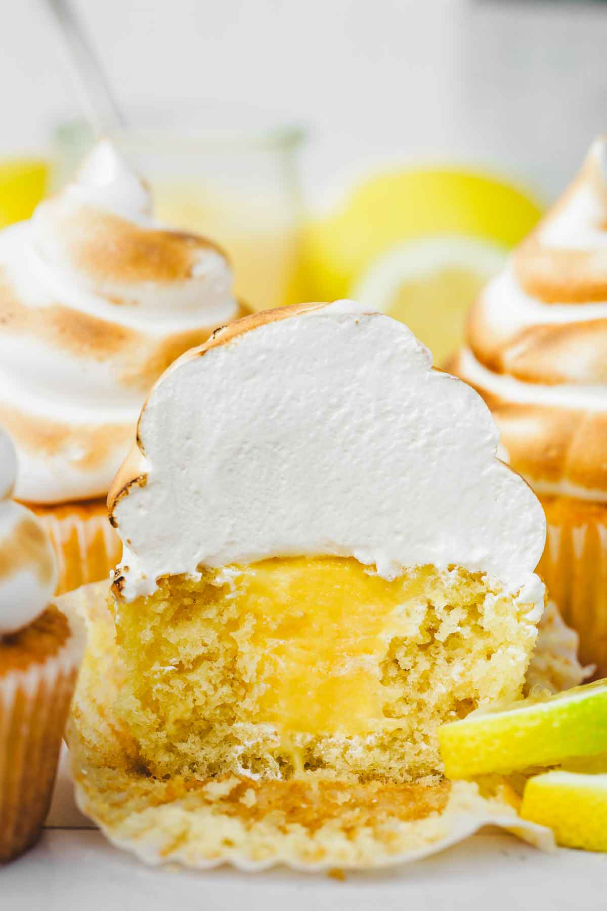 inside view of lemon meringue cupcakes with lemon curd filling