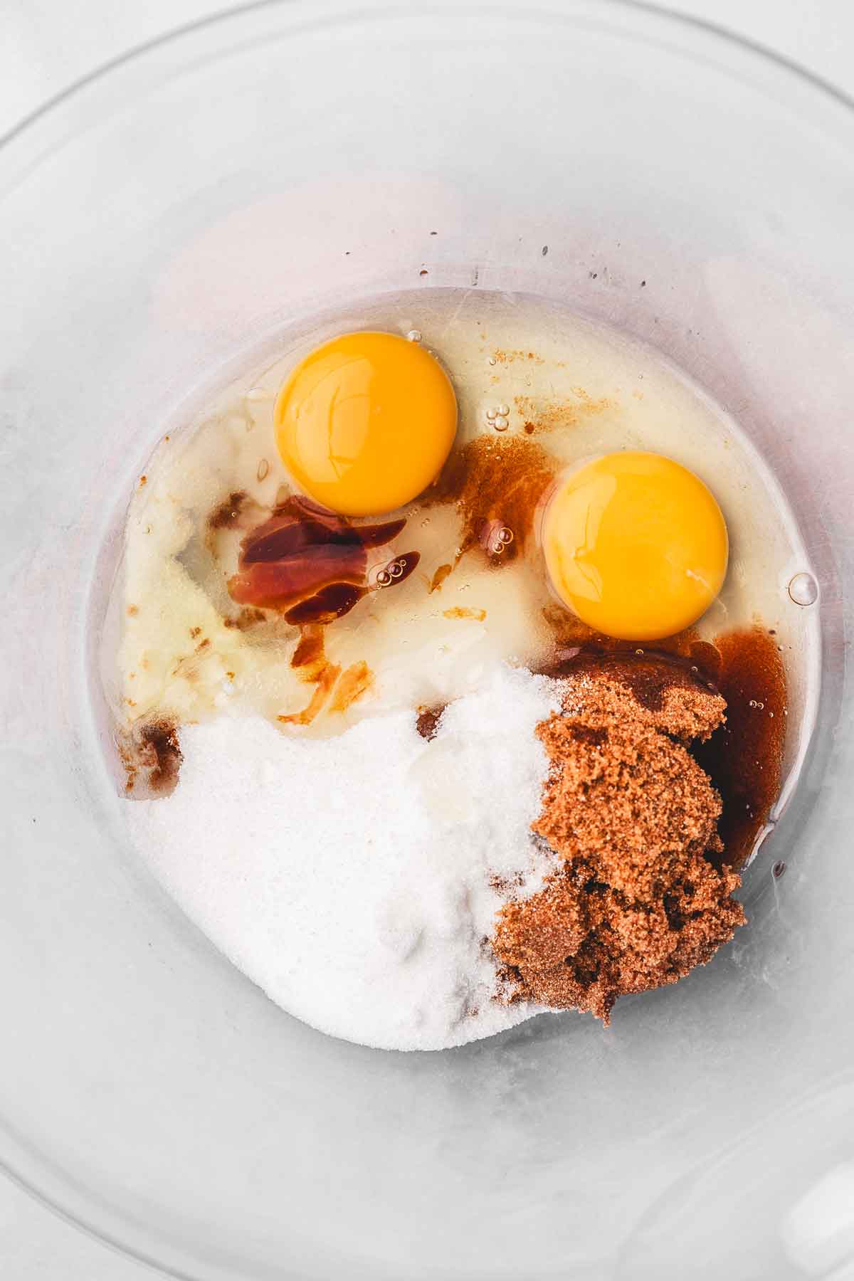 mixing eggs and sugar for oreo brownie cookie dough