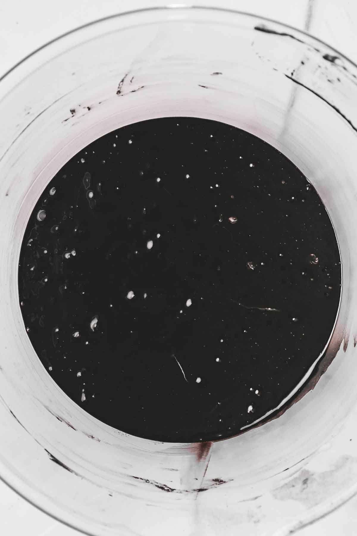 mixing bowl with black cocoa cupcakes batter