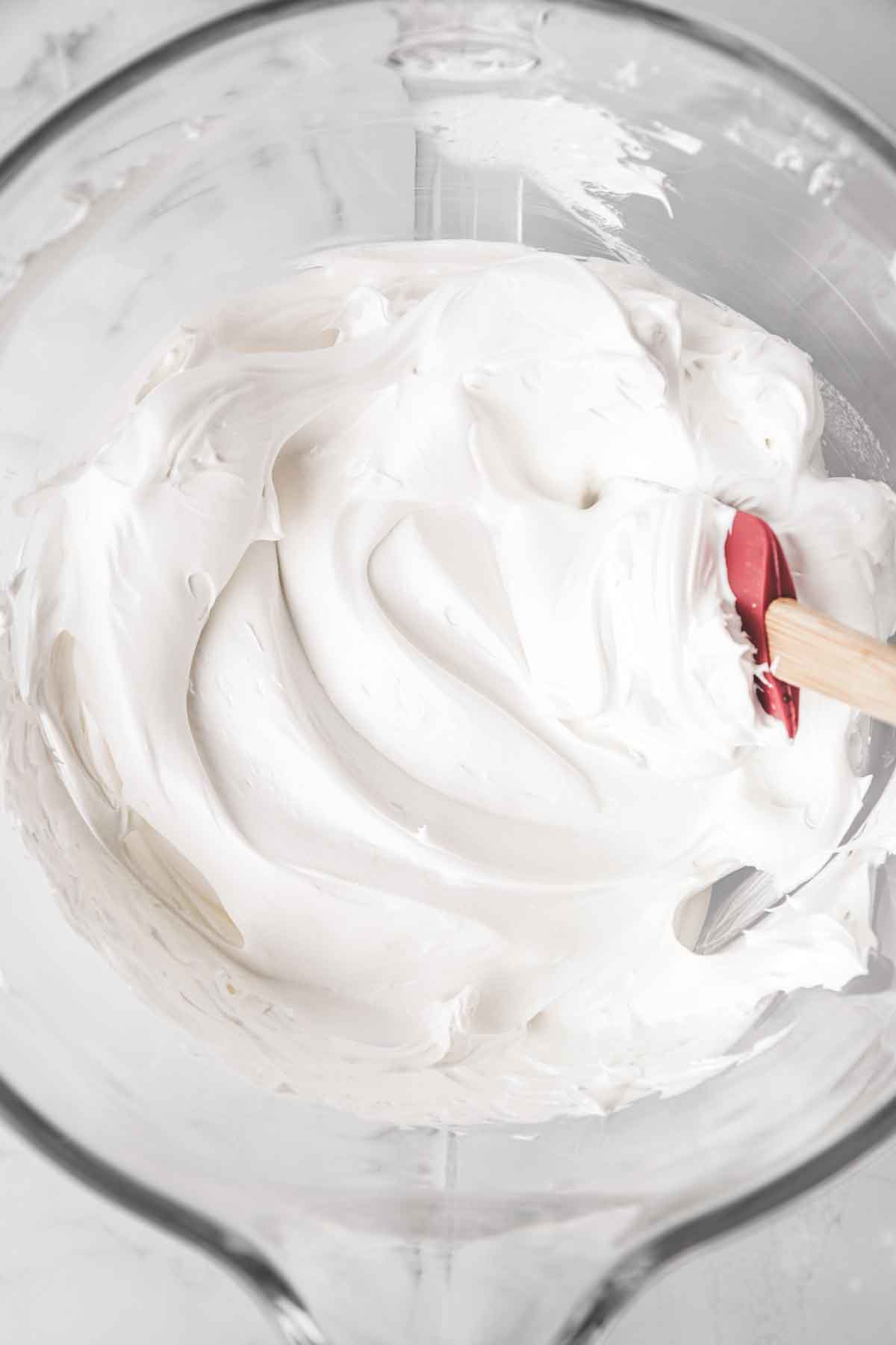 mixing bowl with meringue frosting