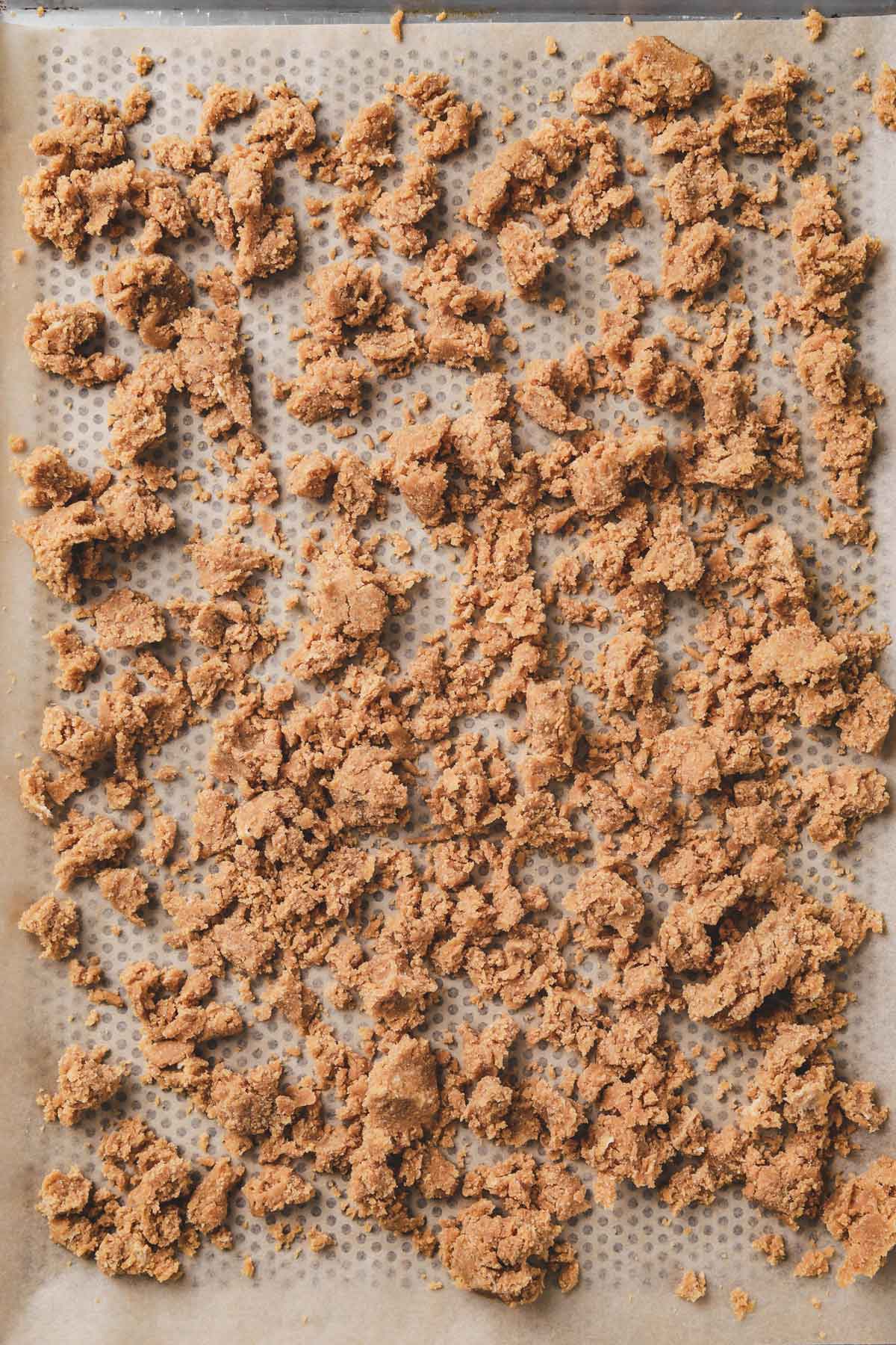 crumbled streusel on a baking sheet