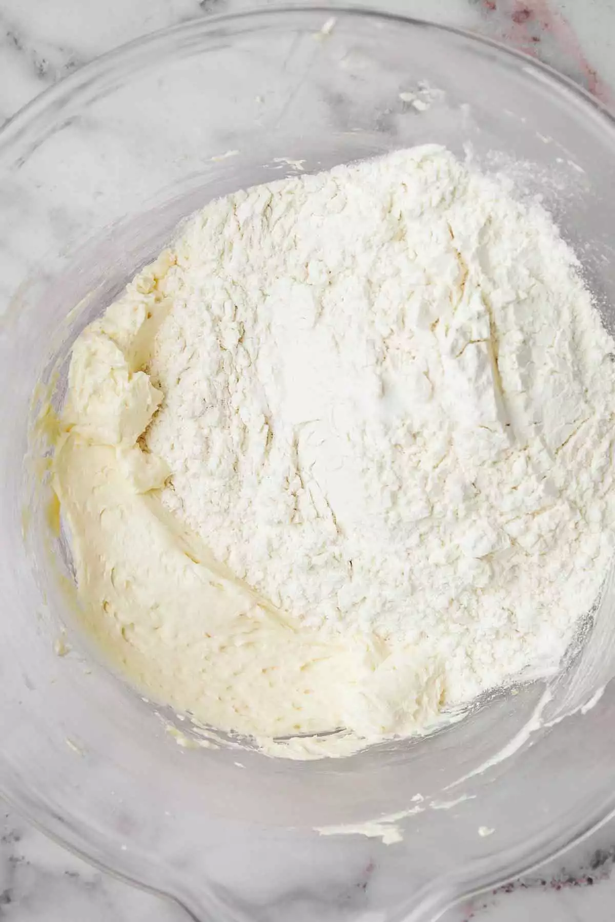 large mixing bowl with flour mixture