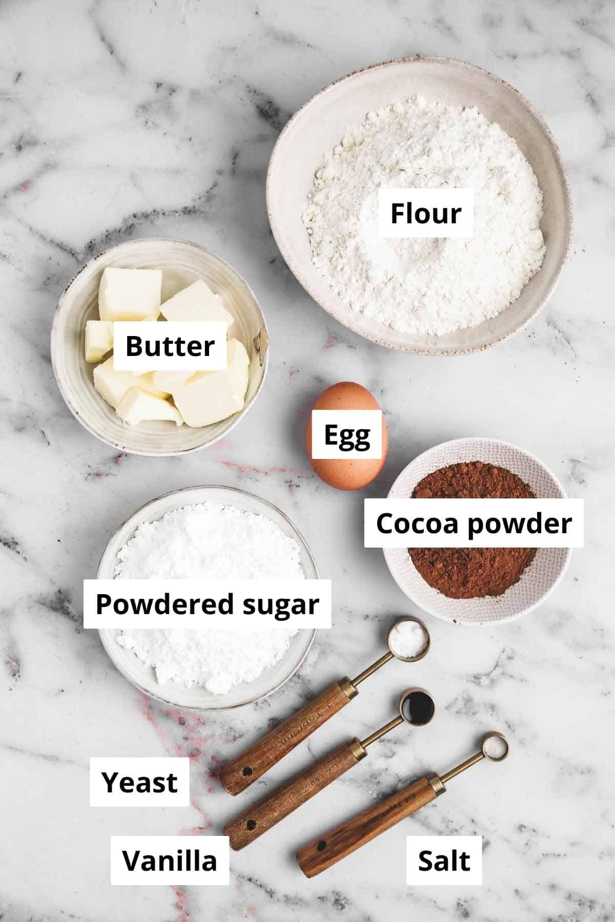 bowls with ingredient for chocolate sugar cookies