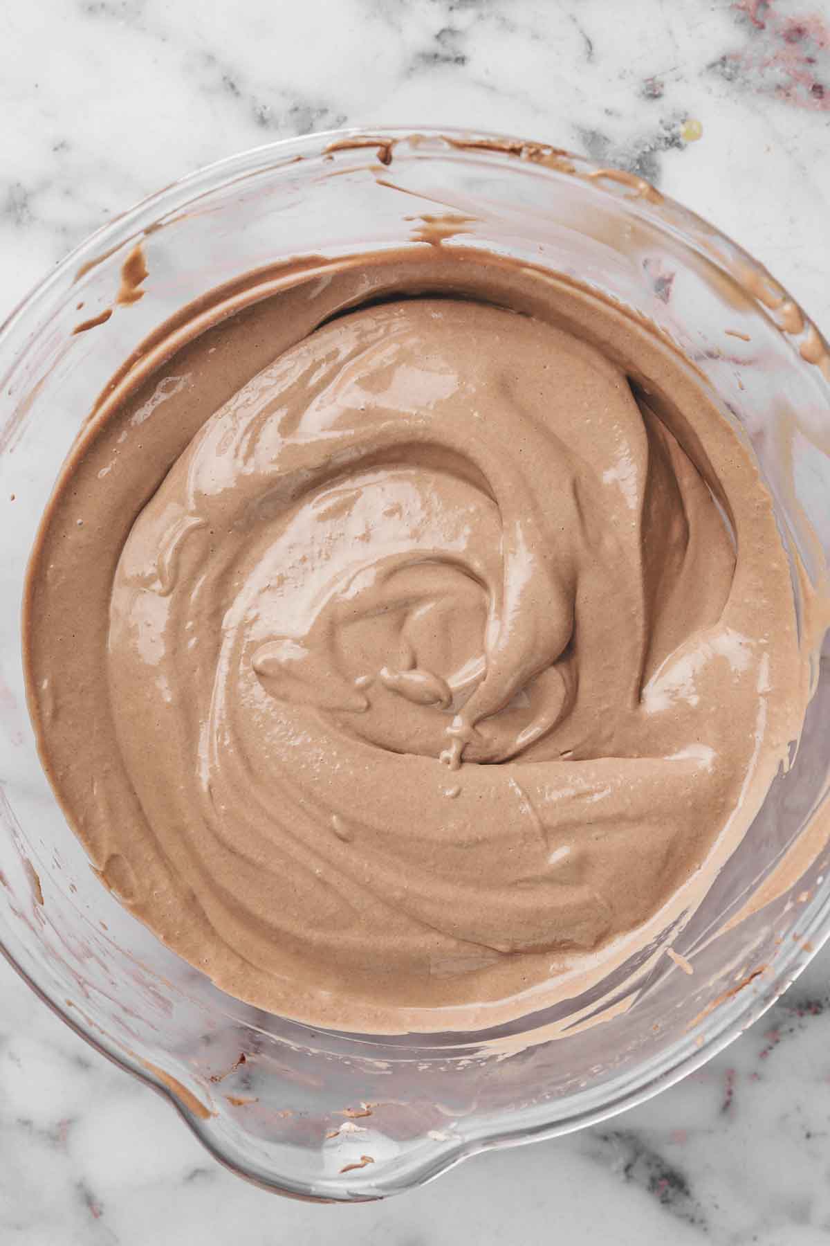 mixing bowl with chocolate cheesecake batter