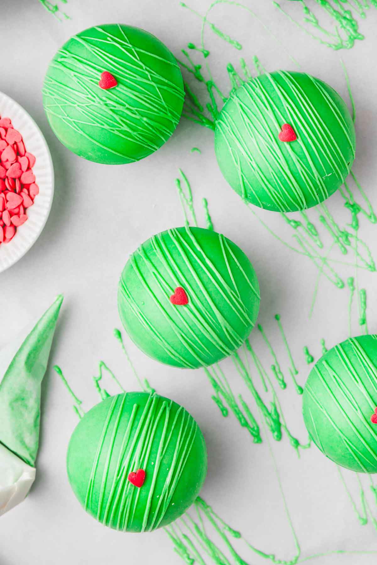 grinch cocoa balls on a table