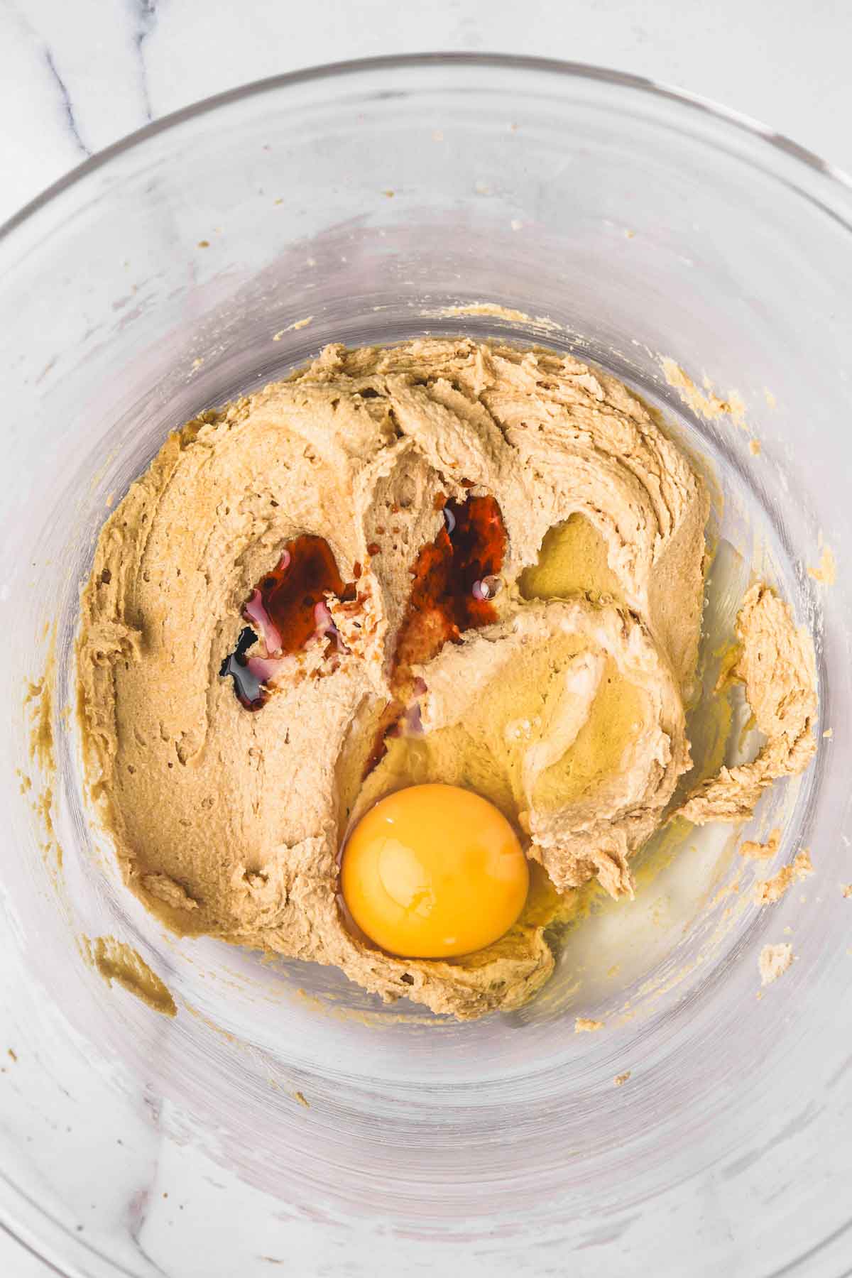 mixing bowl with egg and creamed butter