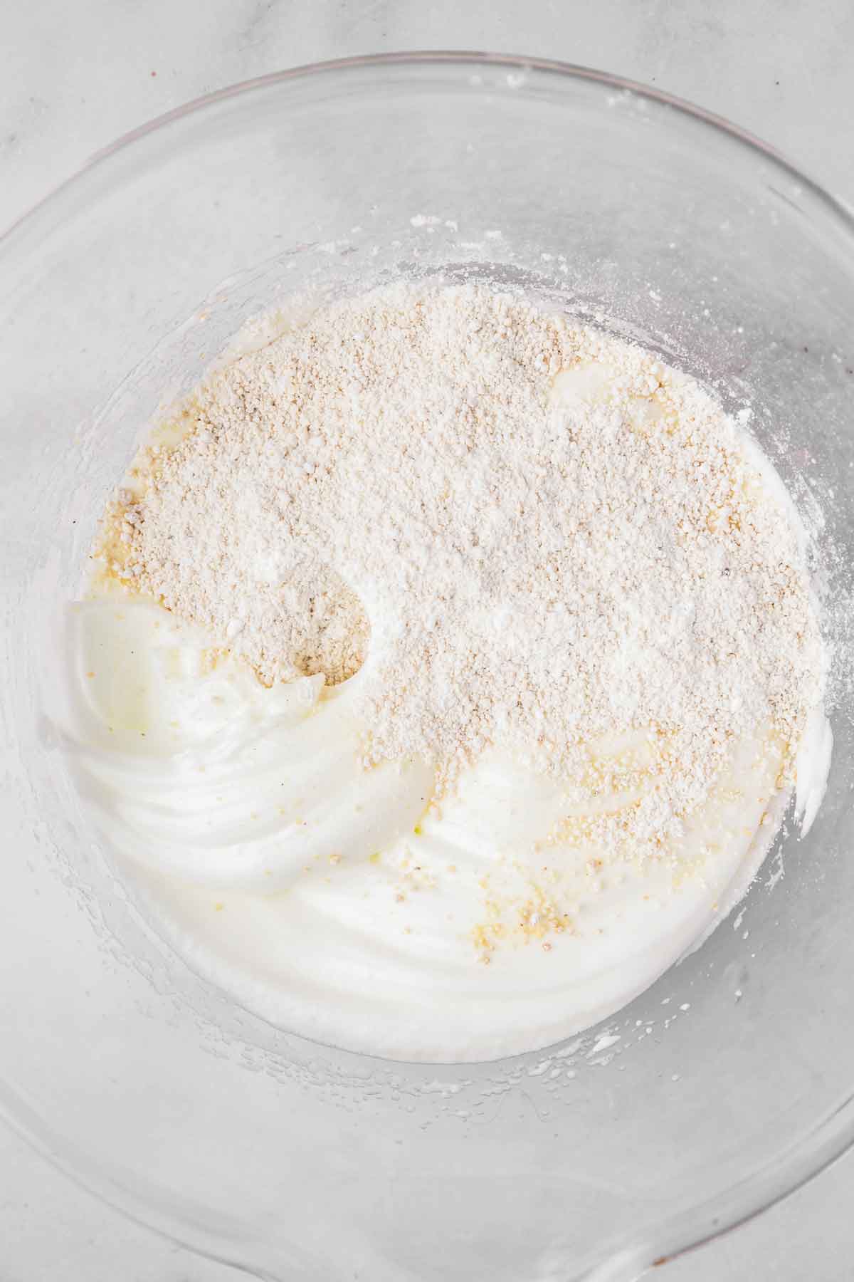 mixing bowl with beated egg white and flour