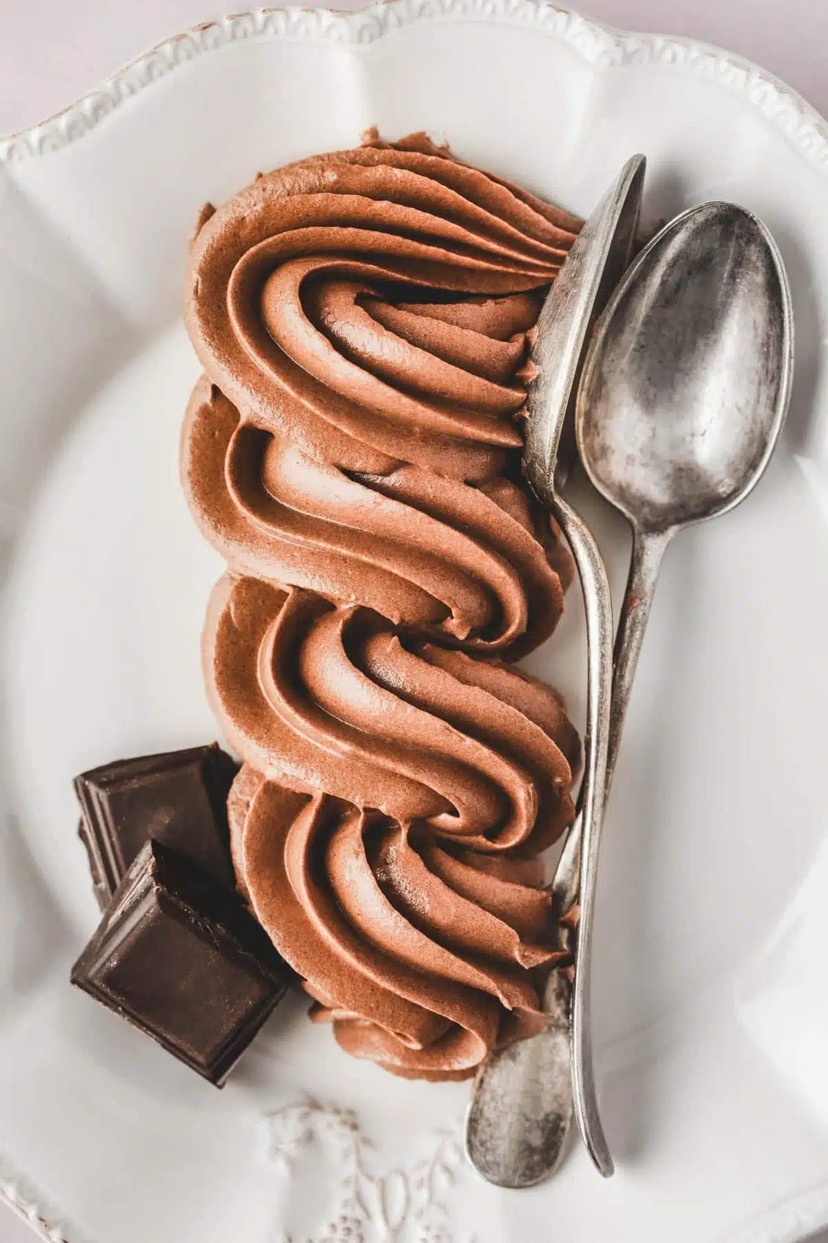 pipped chocolate buttercream in a plate