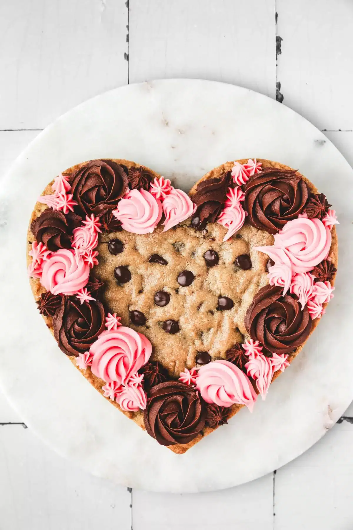 heart chocolate chip cookie with decorated ganache frosting