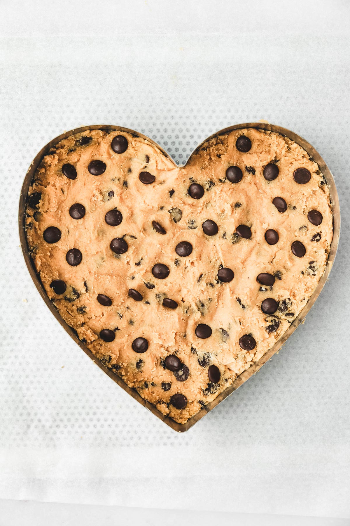 chocolate chip cookie dough on a heart shaped ring