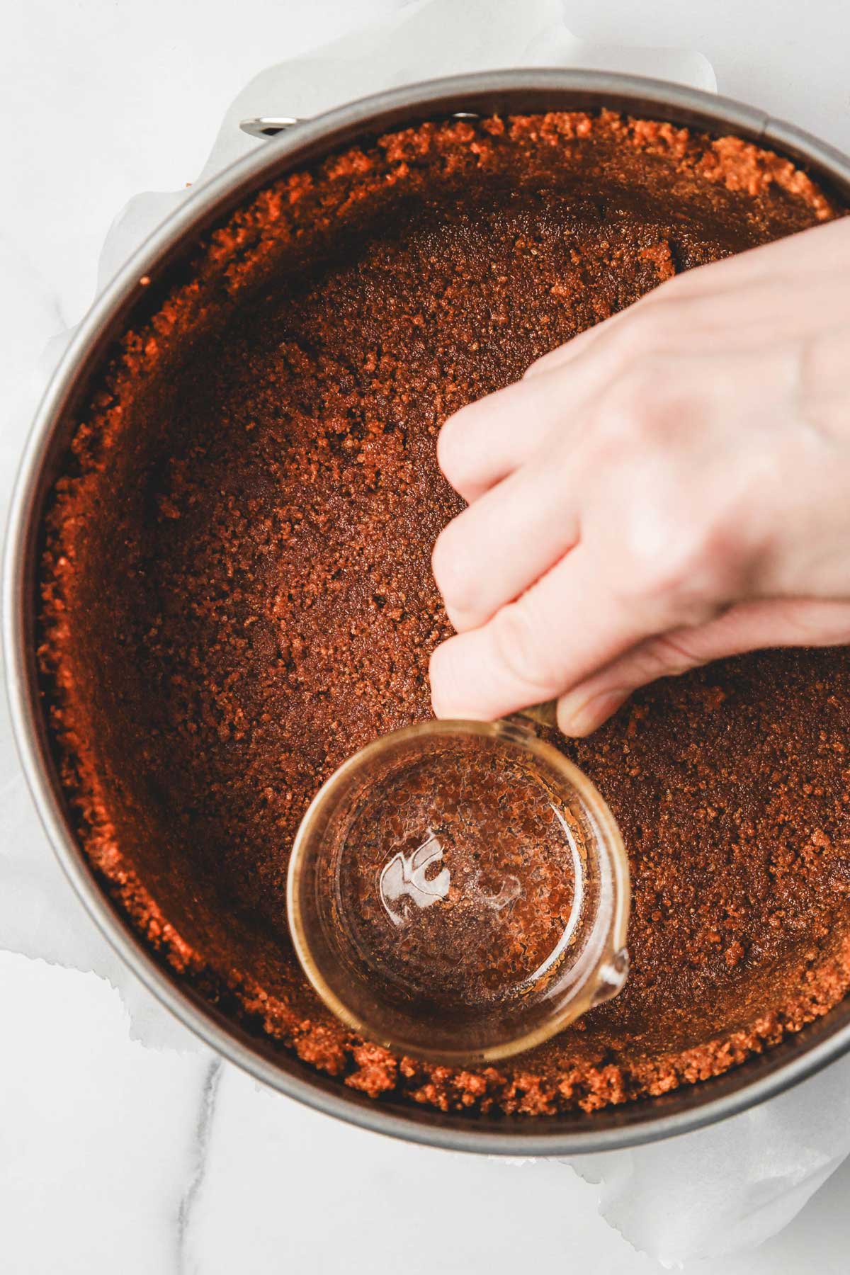 springform pan with biscoff crust