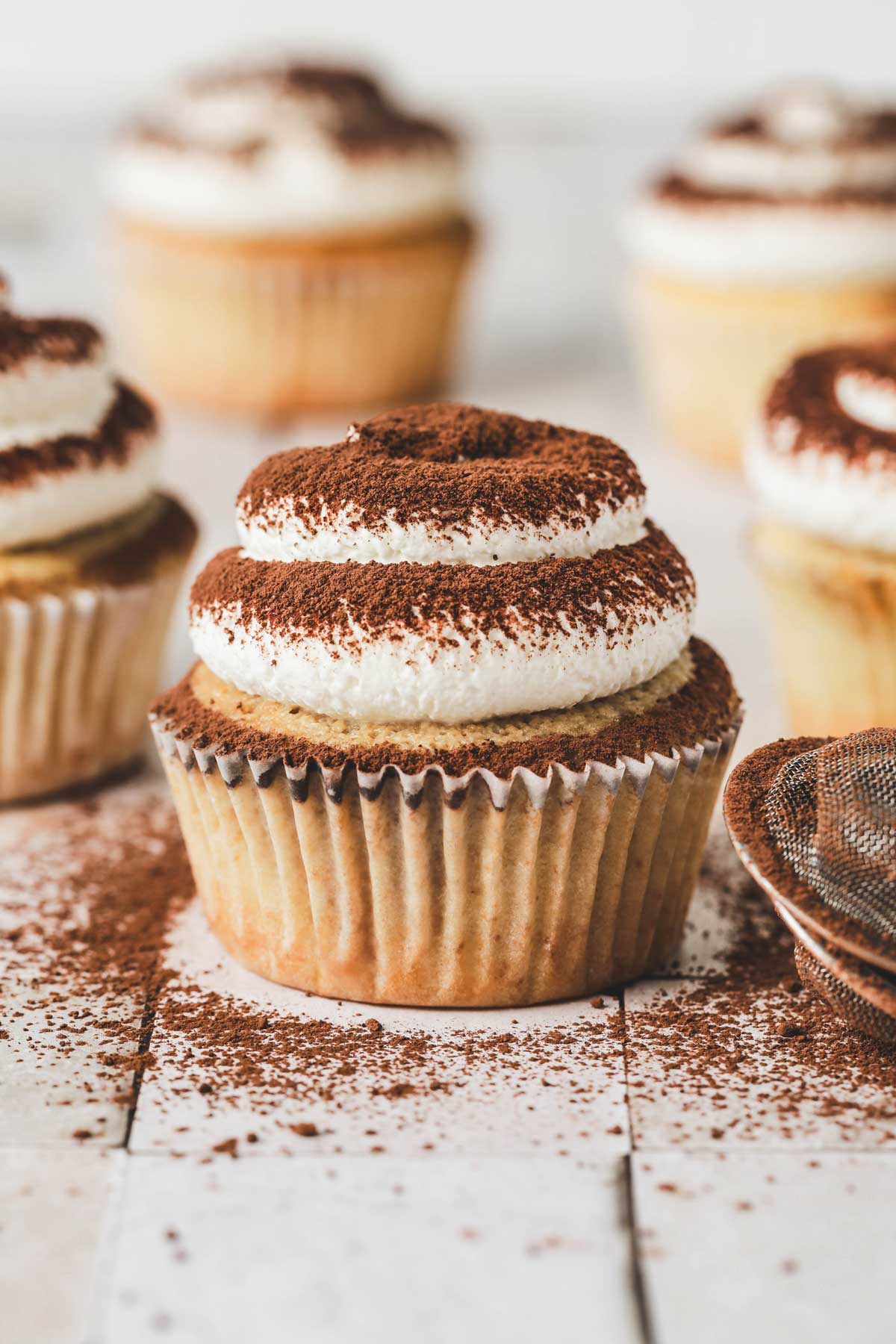 tiramisu cupcakes on a table