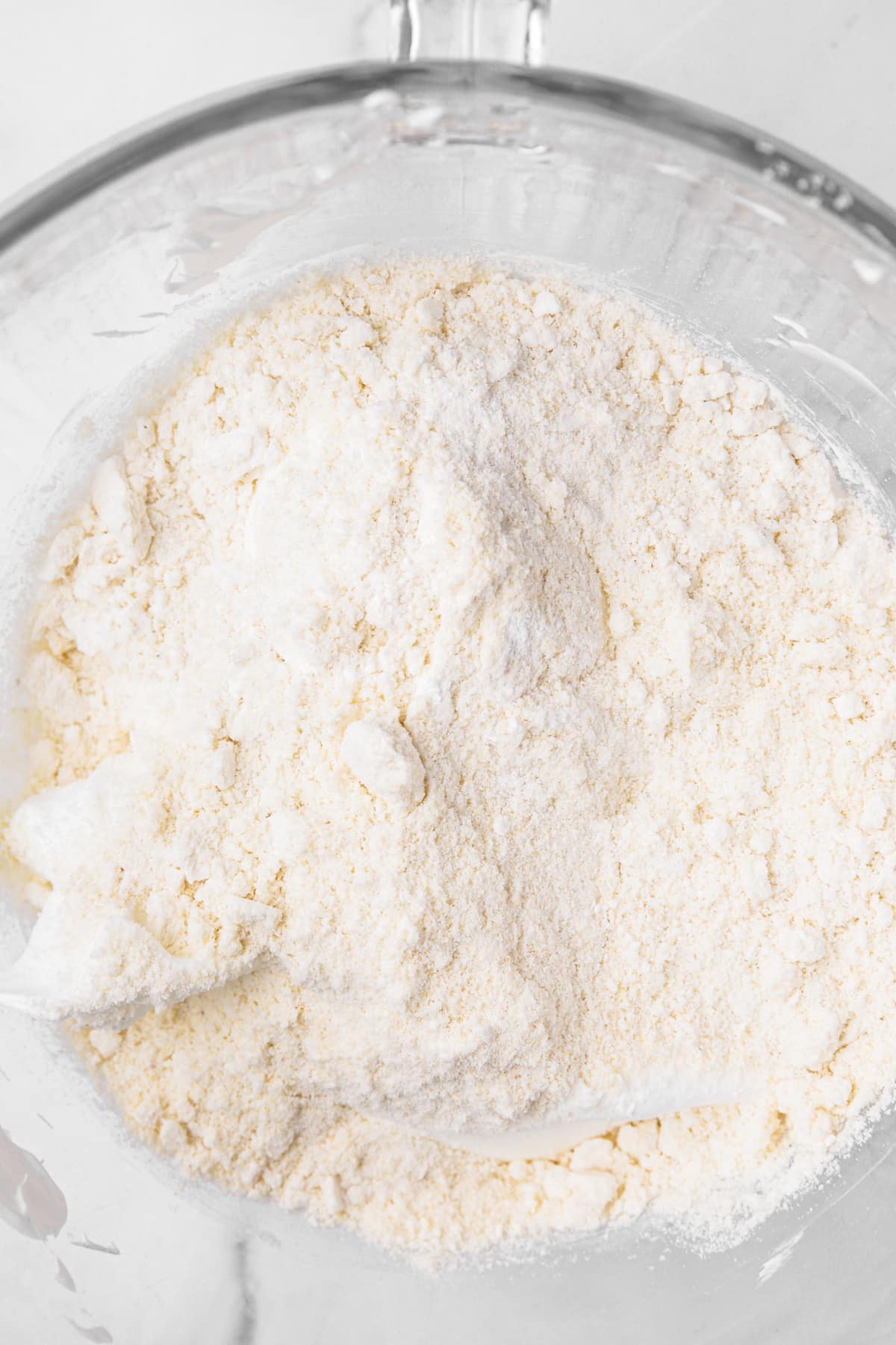 large mixing bowl with dry ingredients in french meringue