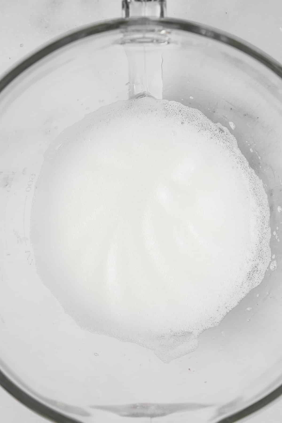 large mixing bowl with egg white mixture