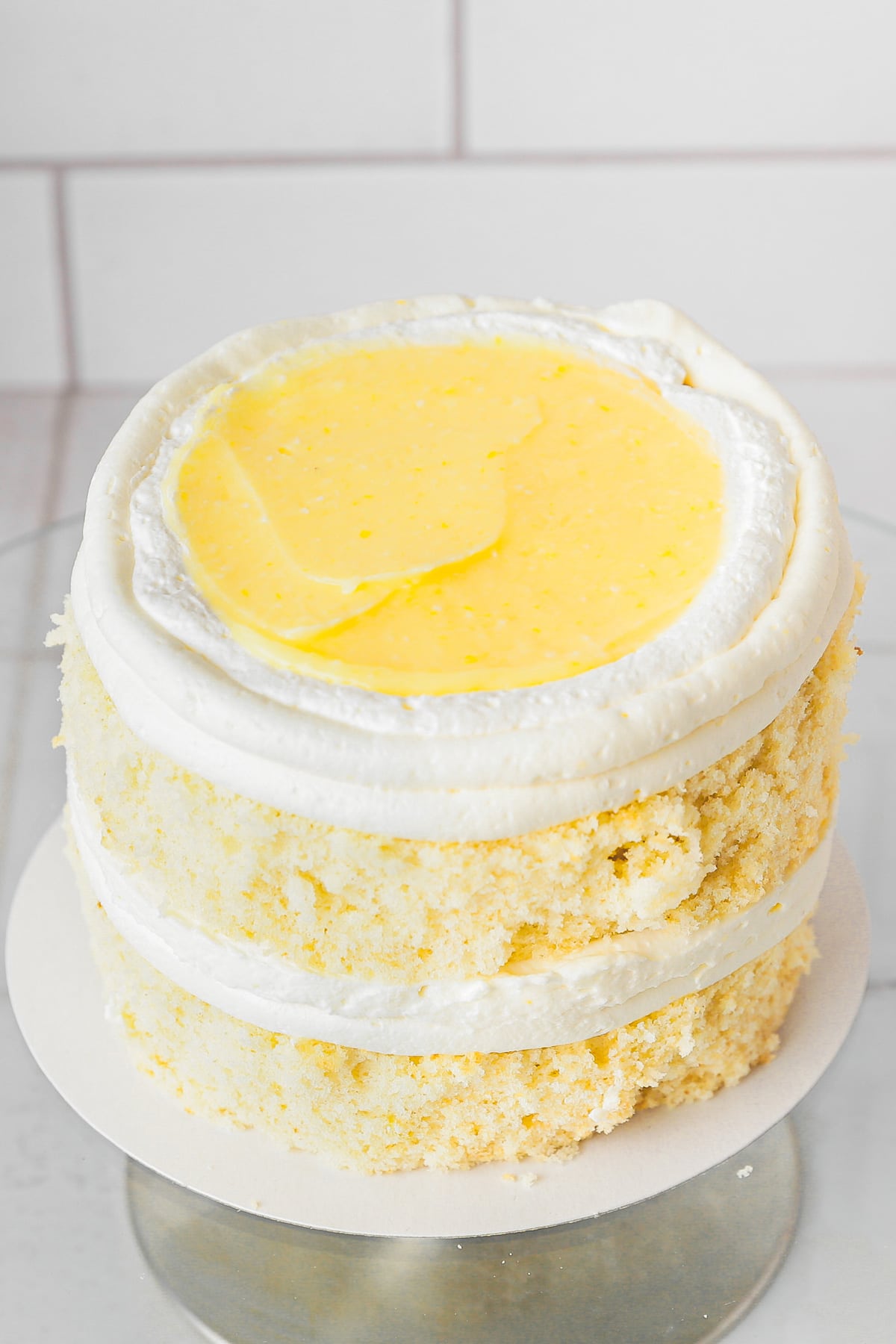 lemon cake layer filled with lemon curd and mascarpone cream
