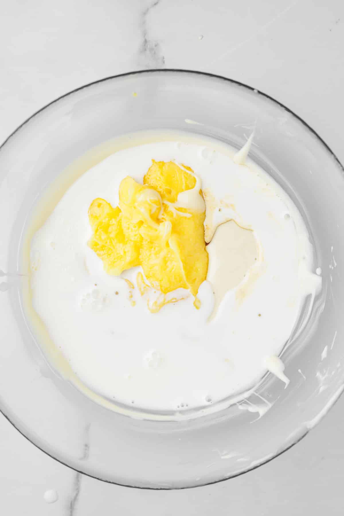 medium bowl with melted white chocolate and lemon curd