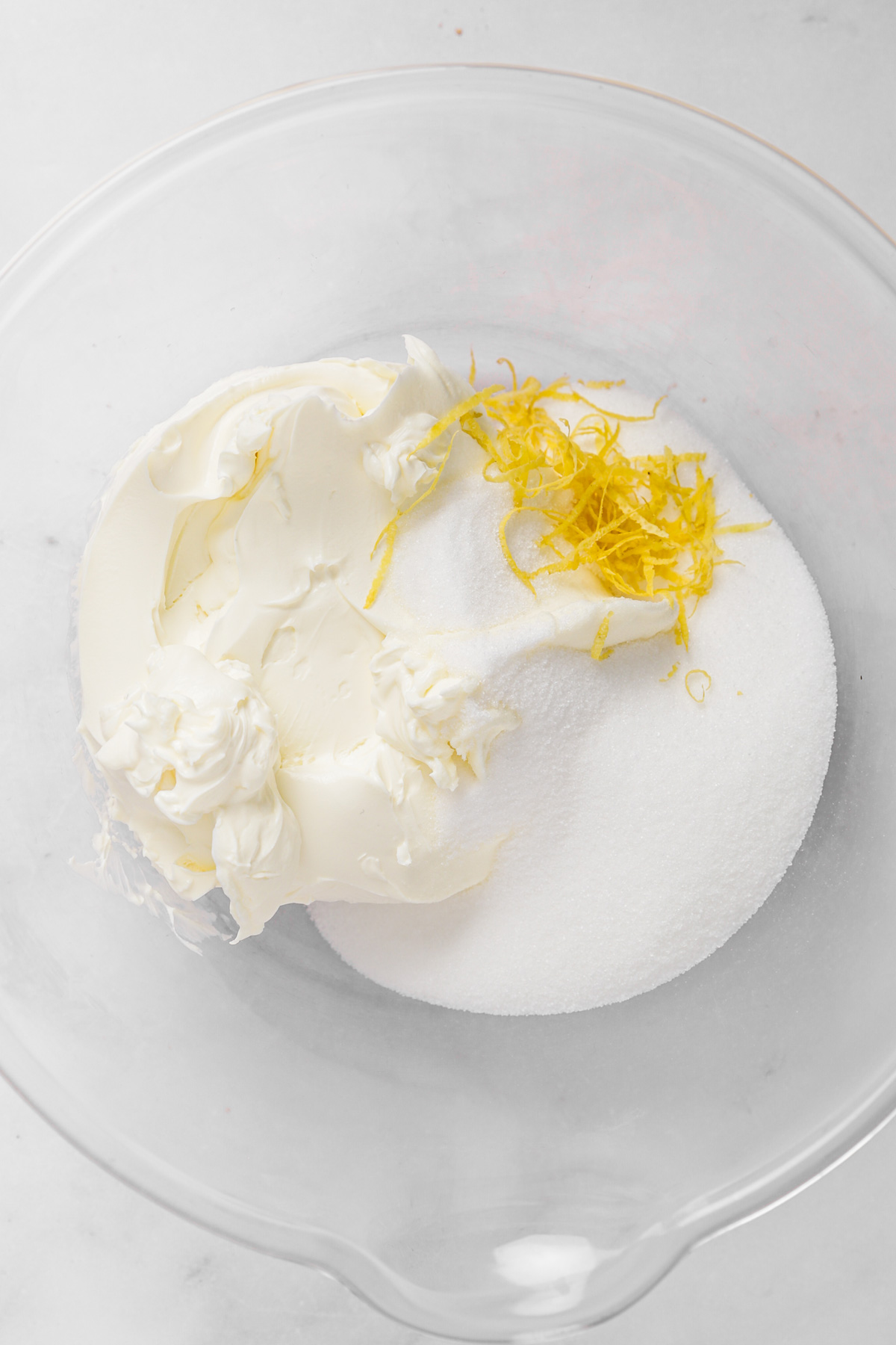 Lemon juice and cream cheese mixture for the lemon cheesecake batter