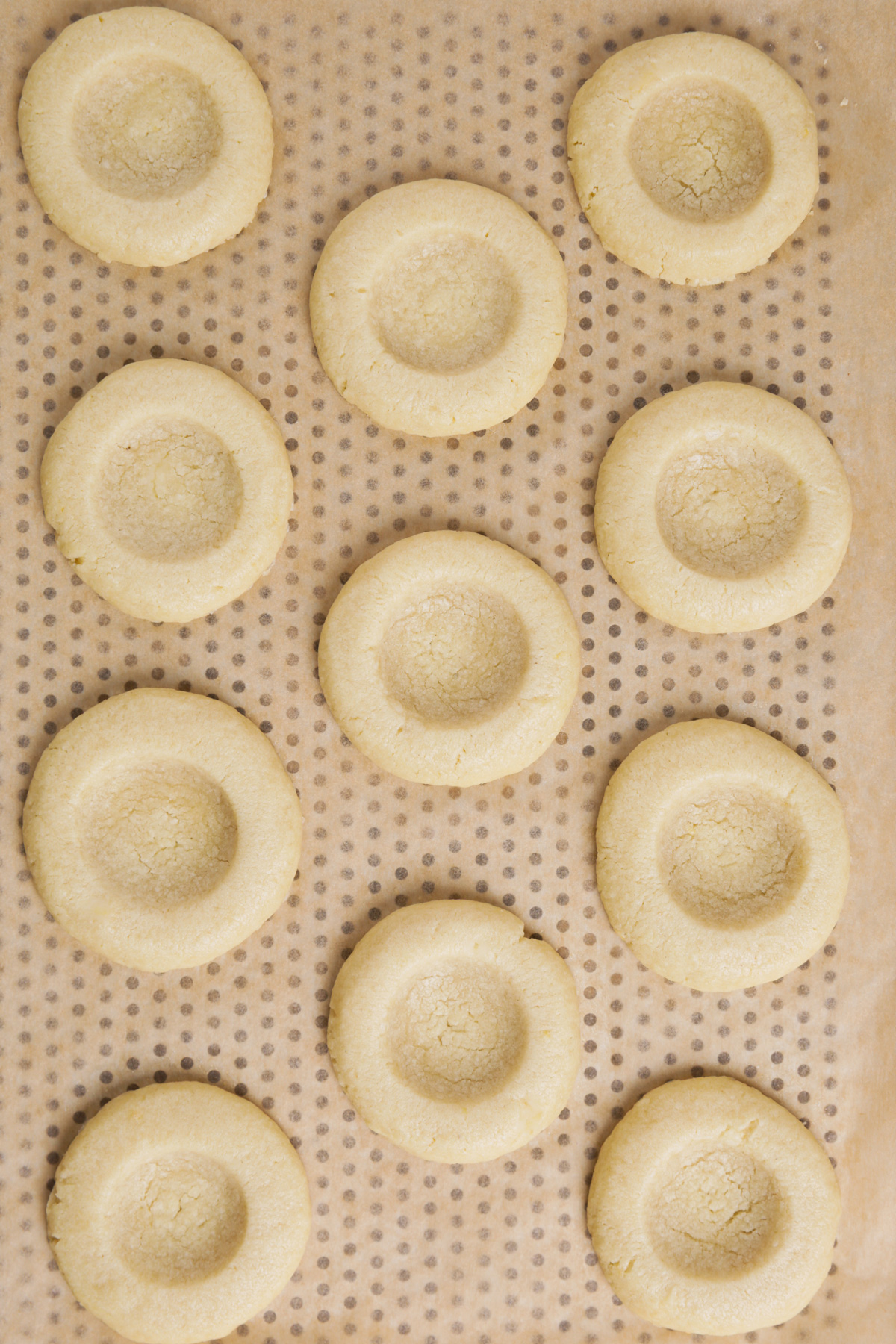 baked lemon thumbprint cookies with golden edges