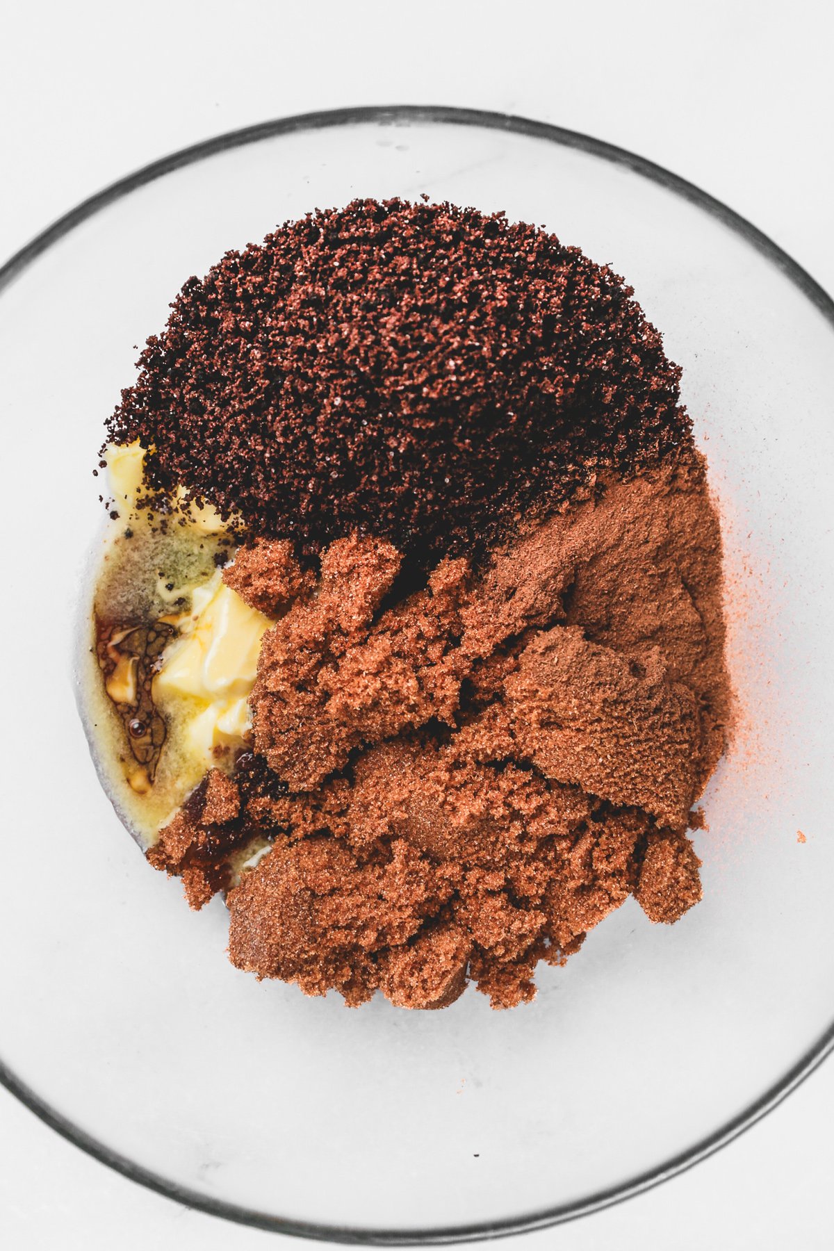 Bowl of Oreo cinnamon filling made with brown sugar and crushed cookies